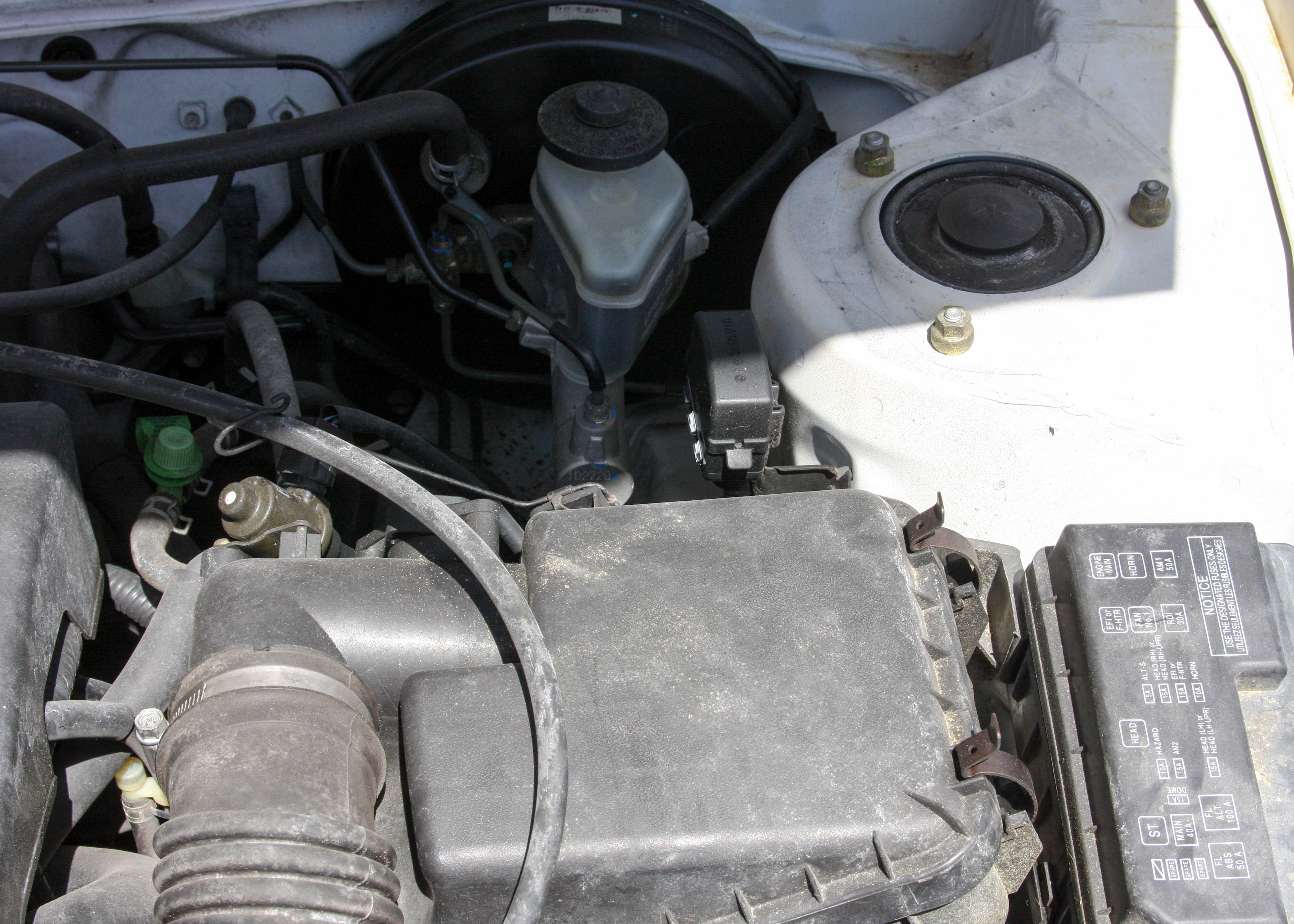 2002 White Toyota Corolla LE Sedan