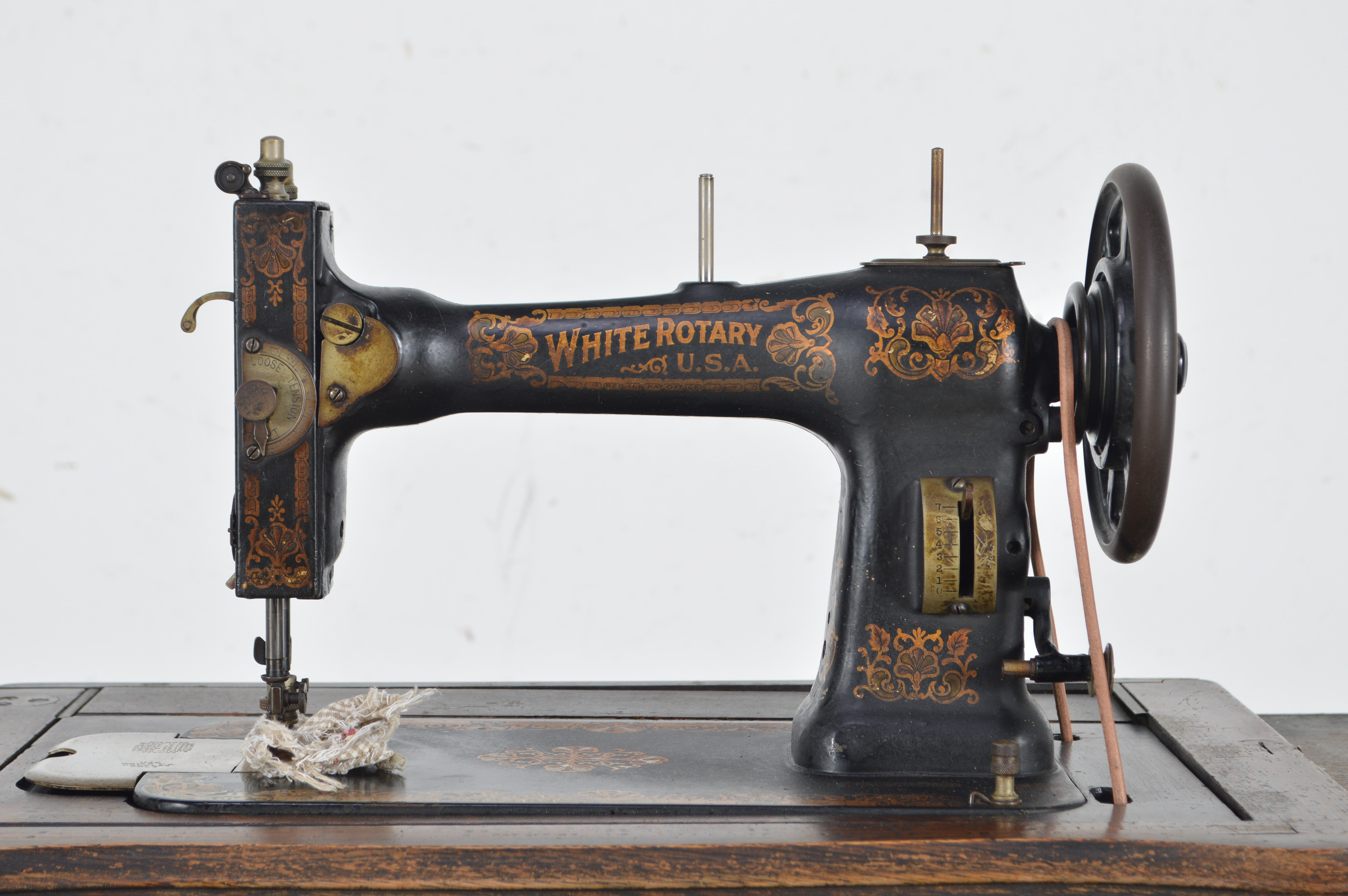 Antique White Rotary U.S.A. Sewing Machine and Oak Cabinet