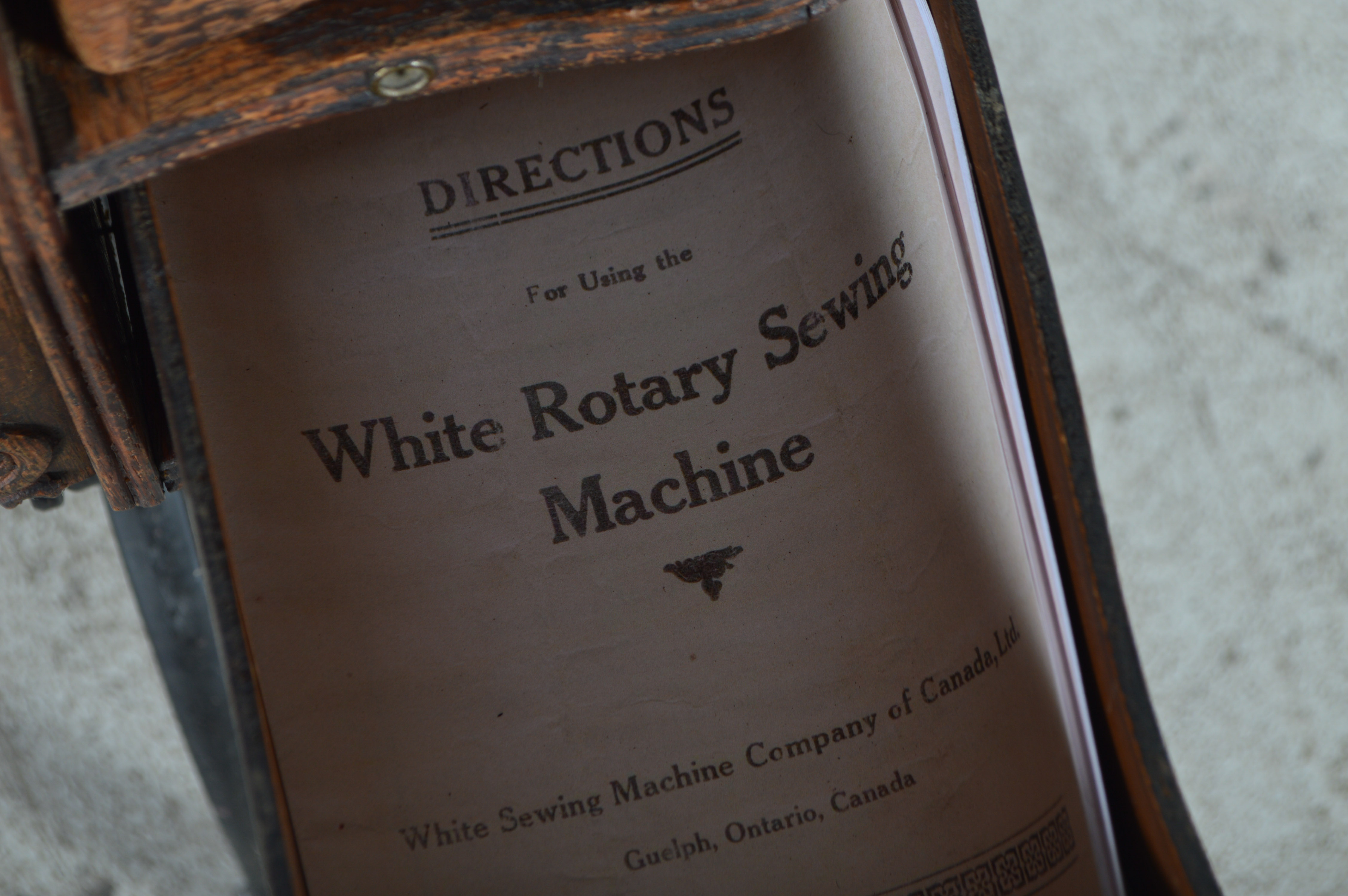 Antique White Rotary U.S.A. Sewing Machine and Oak Cabinet