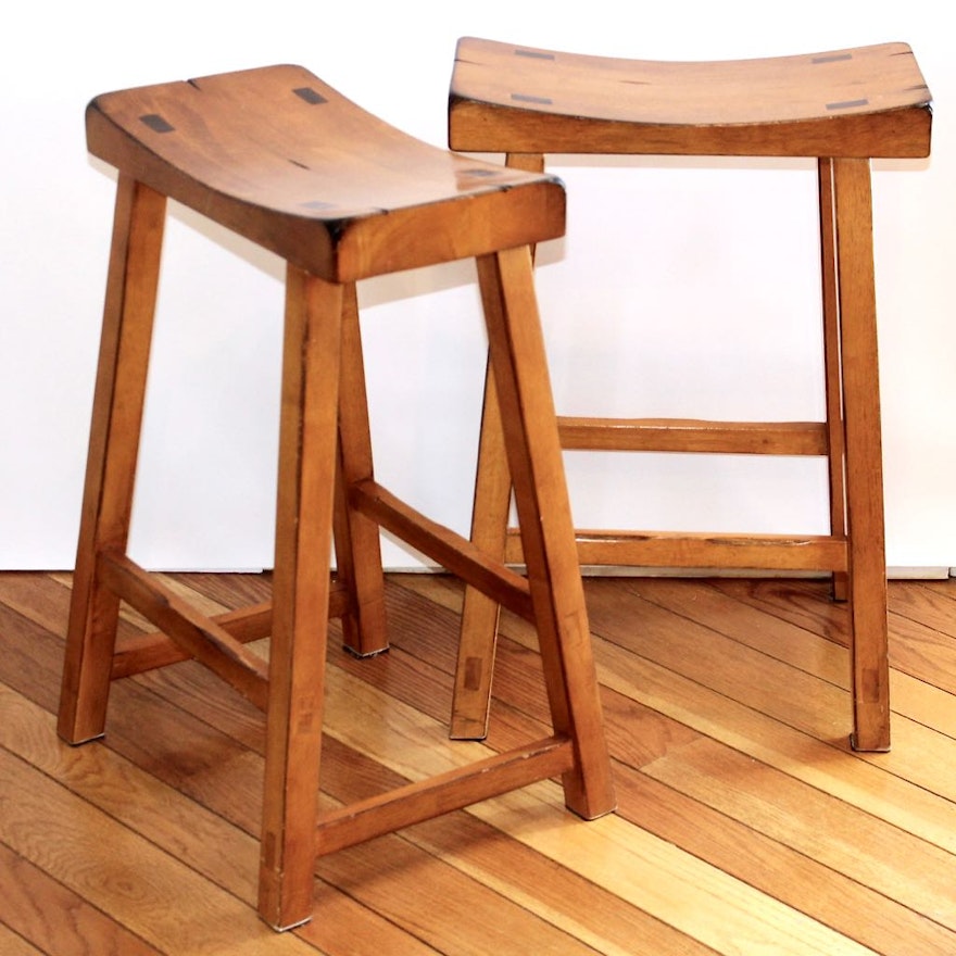 Two Saddle Stools in Honey Stain Finish