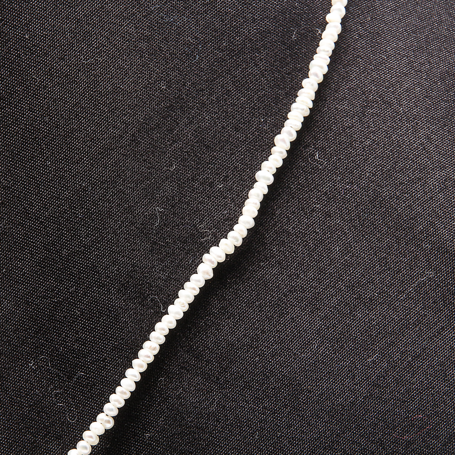 Artisan Crafted Seed Pearl Necklace with Multicolored Pearl Drop