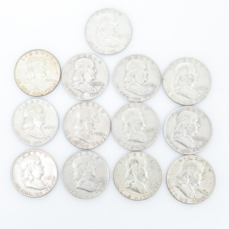 Thirteen Franklin Half Dollars