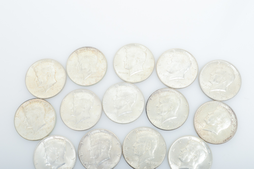 Nineteen 1964 Kennedy Half Dollars