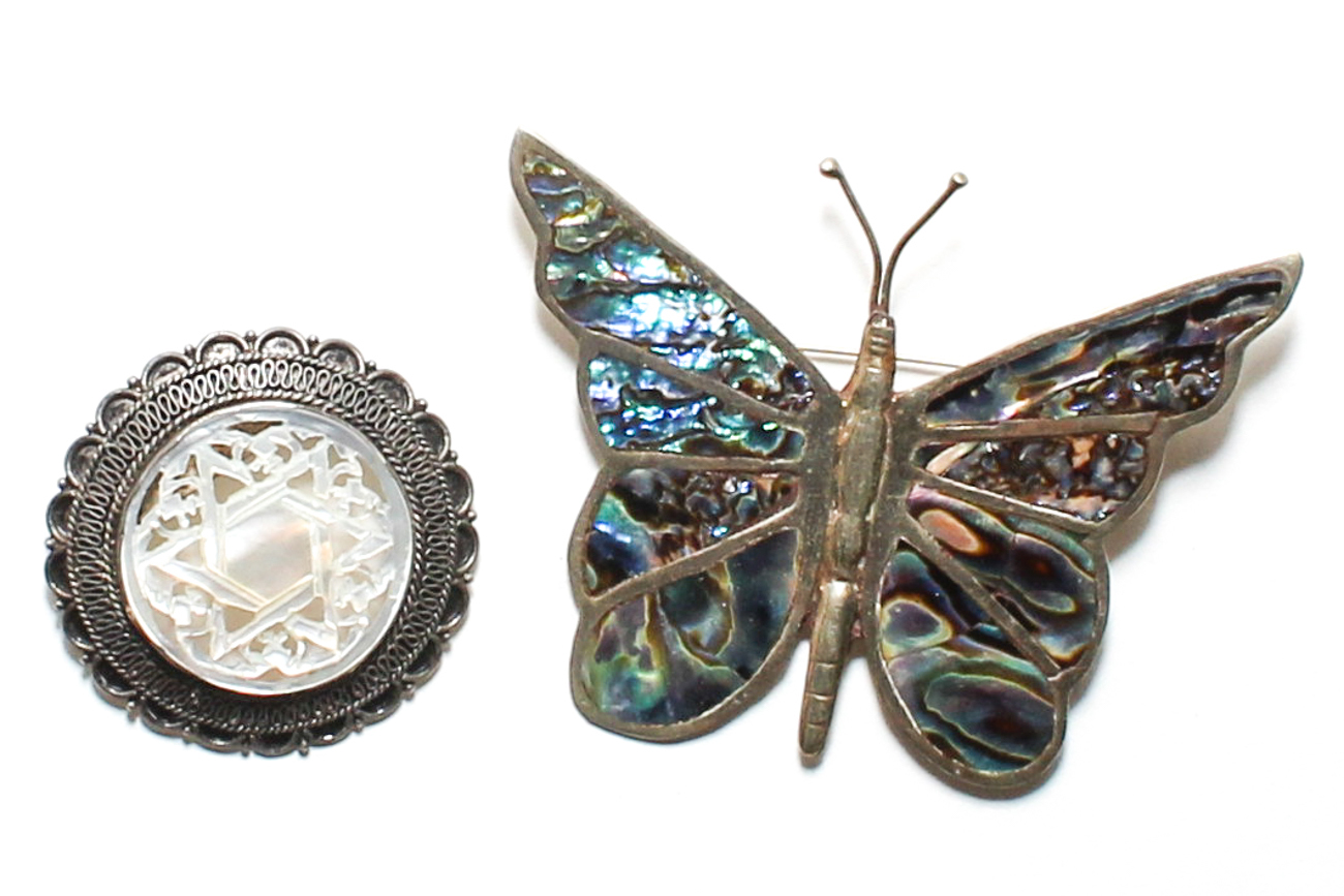 Pair Of Sterling Silver Brooches
