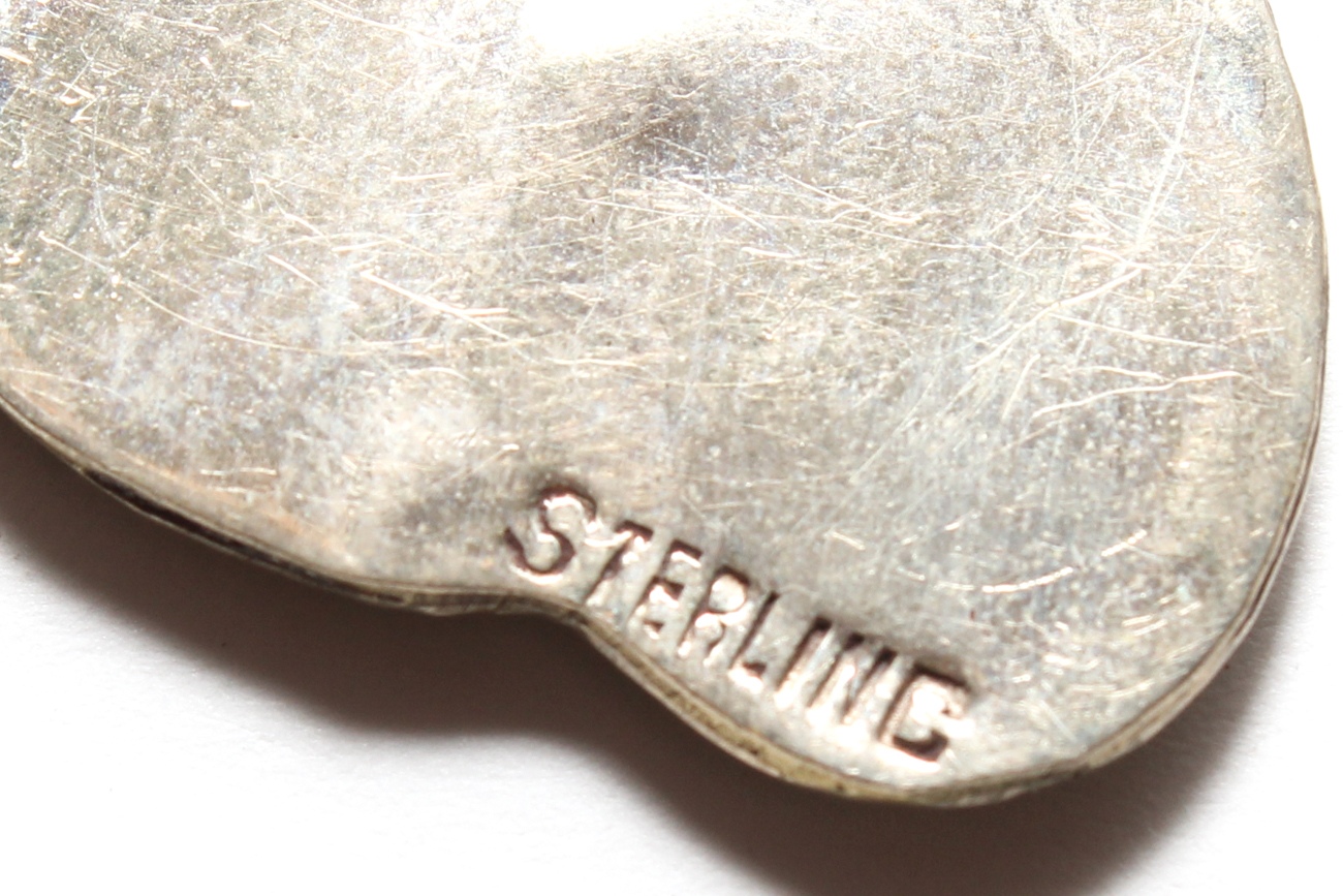 Pair Of Sterling Silver Brooches