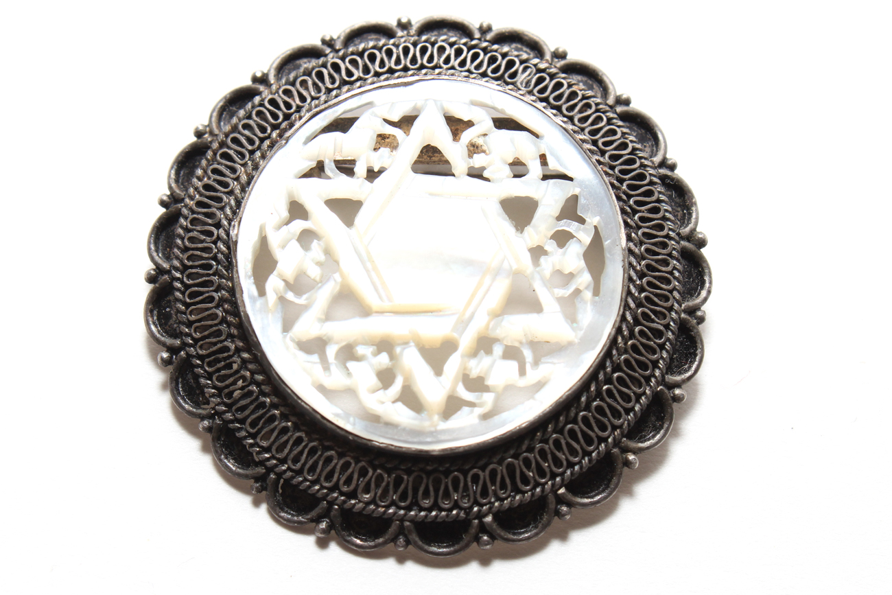 Pair Of Sterling Silver Brooches