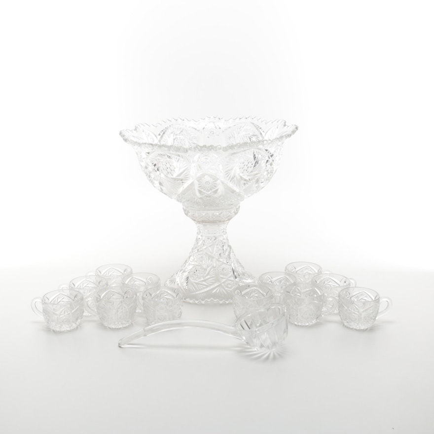 Footed Punch Bowl With Ladle And Twelve Cups