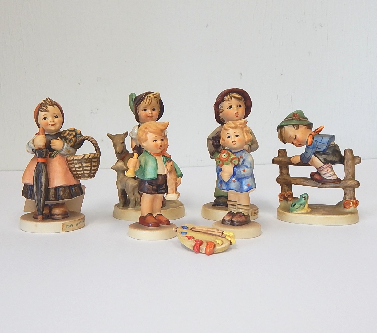 Seven M.I. Hummel Figurines