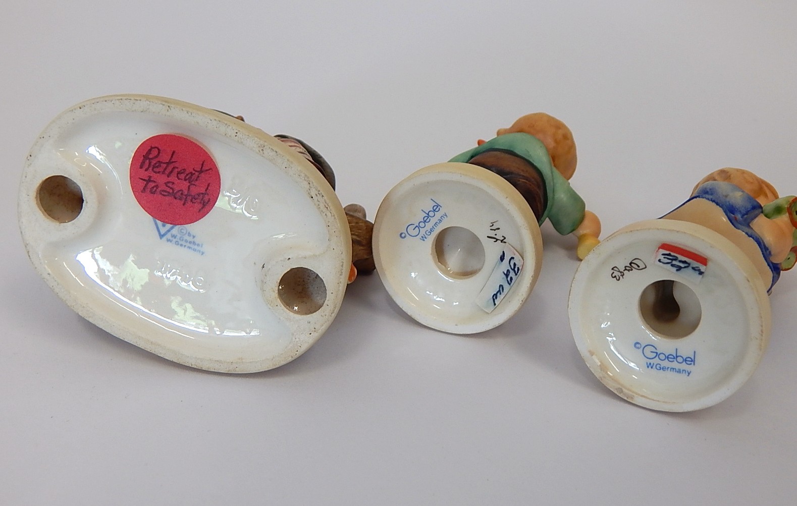 Seven M.I. Hummel Figurines