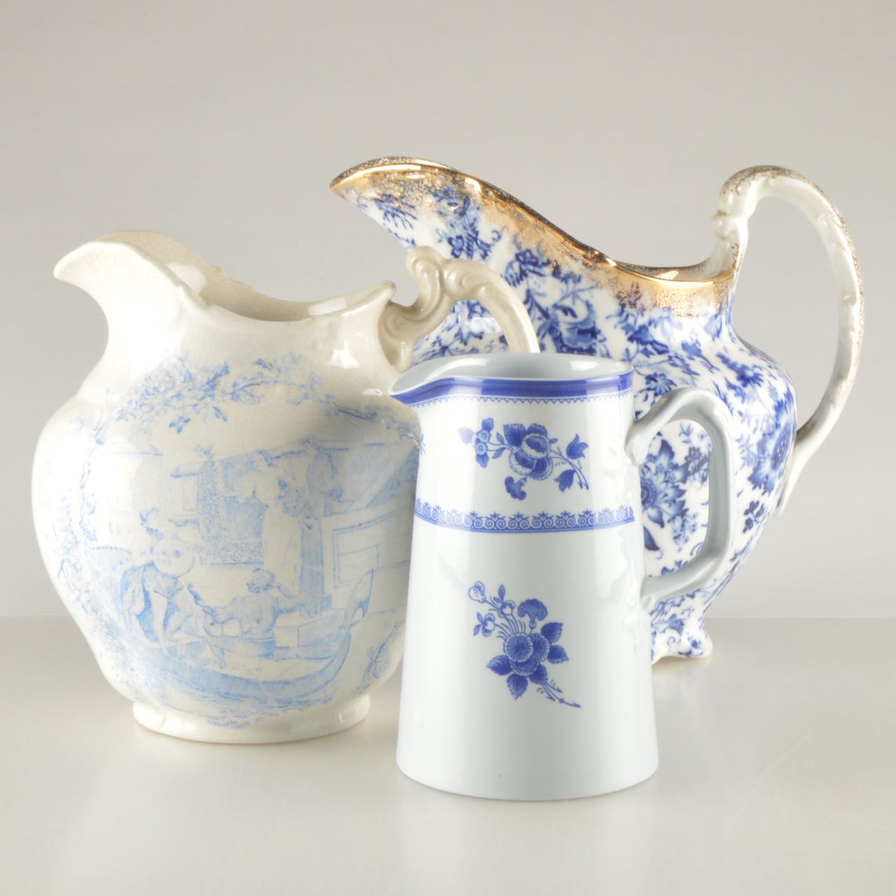 Blue and White Ceramic Pitchers Including Copeland Spode