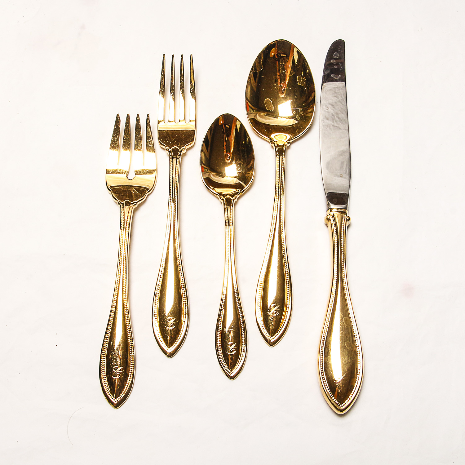 Set of Oneida Gold Plated Flatware