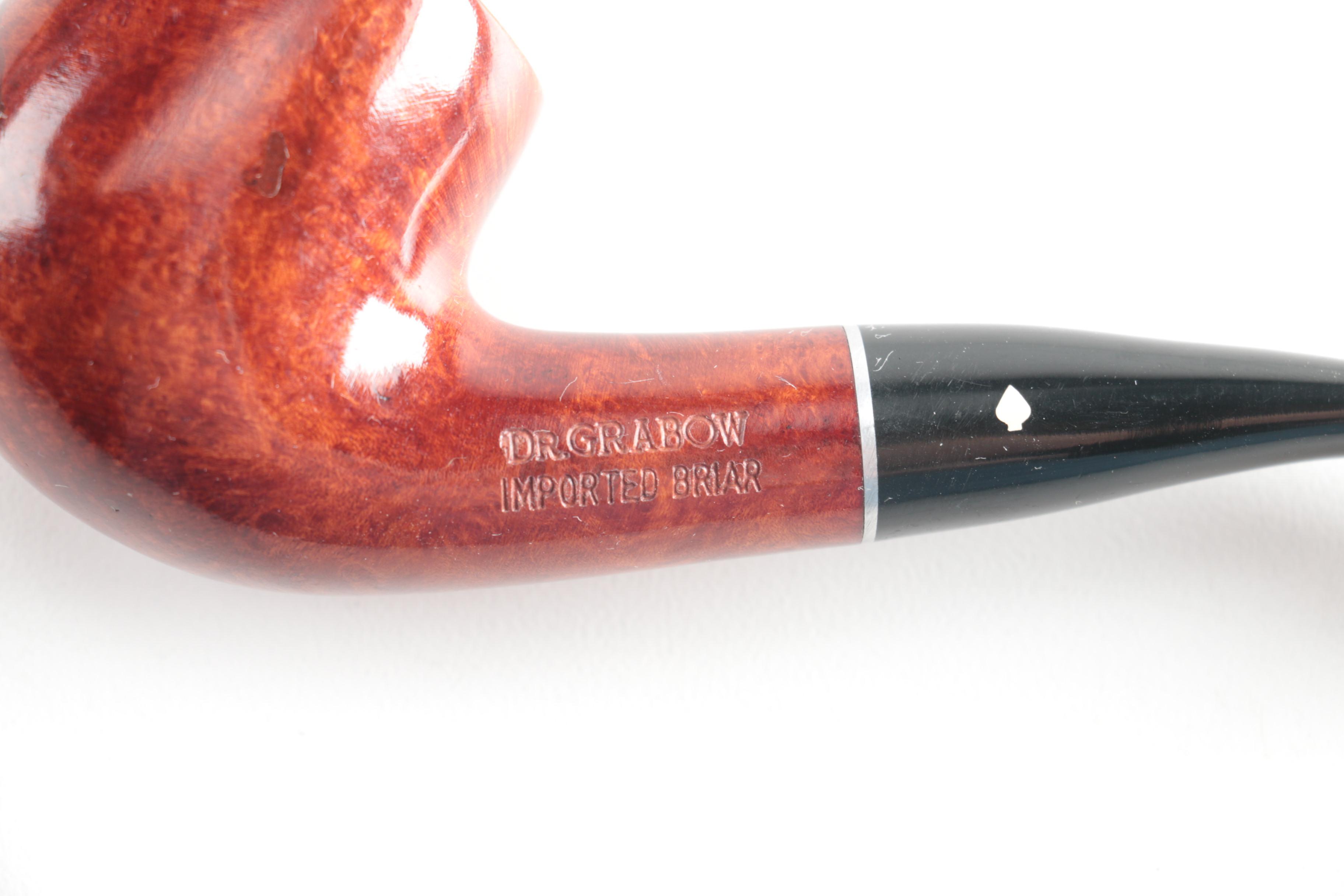 Pipes, Stands and Copper Tone Jar