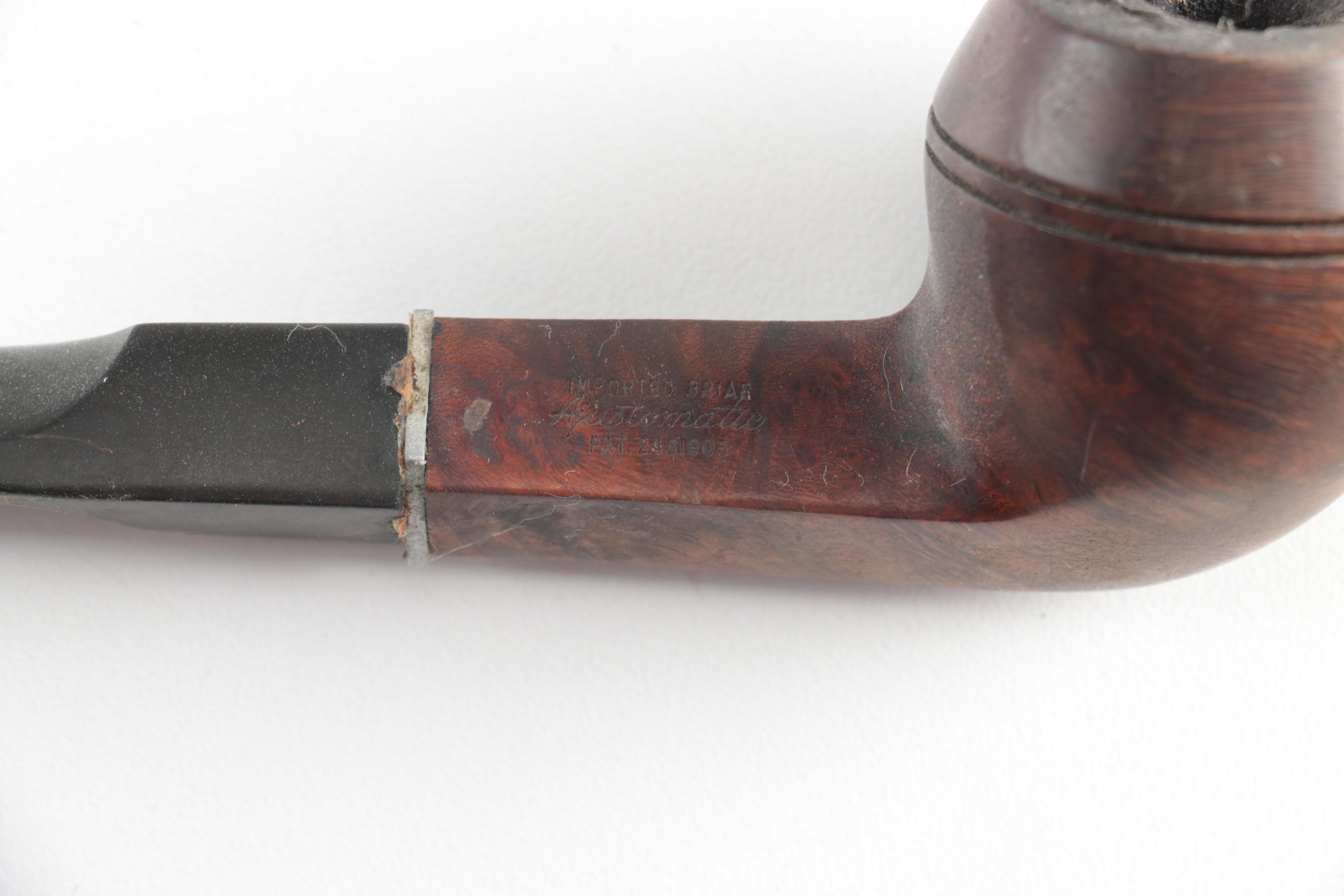 Pipes, Stands and Copper Tone Jar