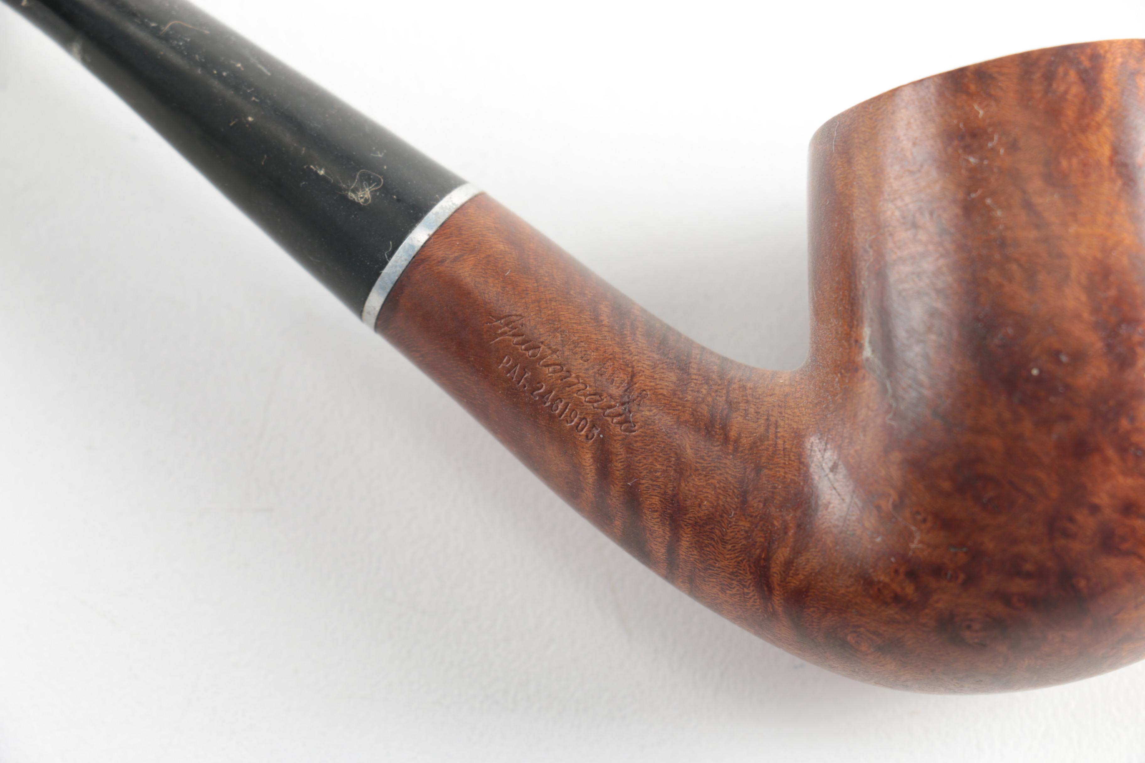 Pipes, Stands and Copper Tone Jar