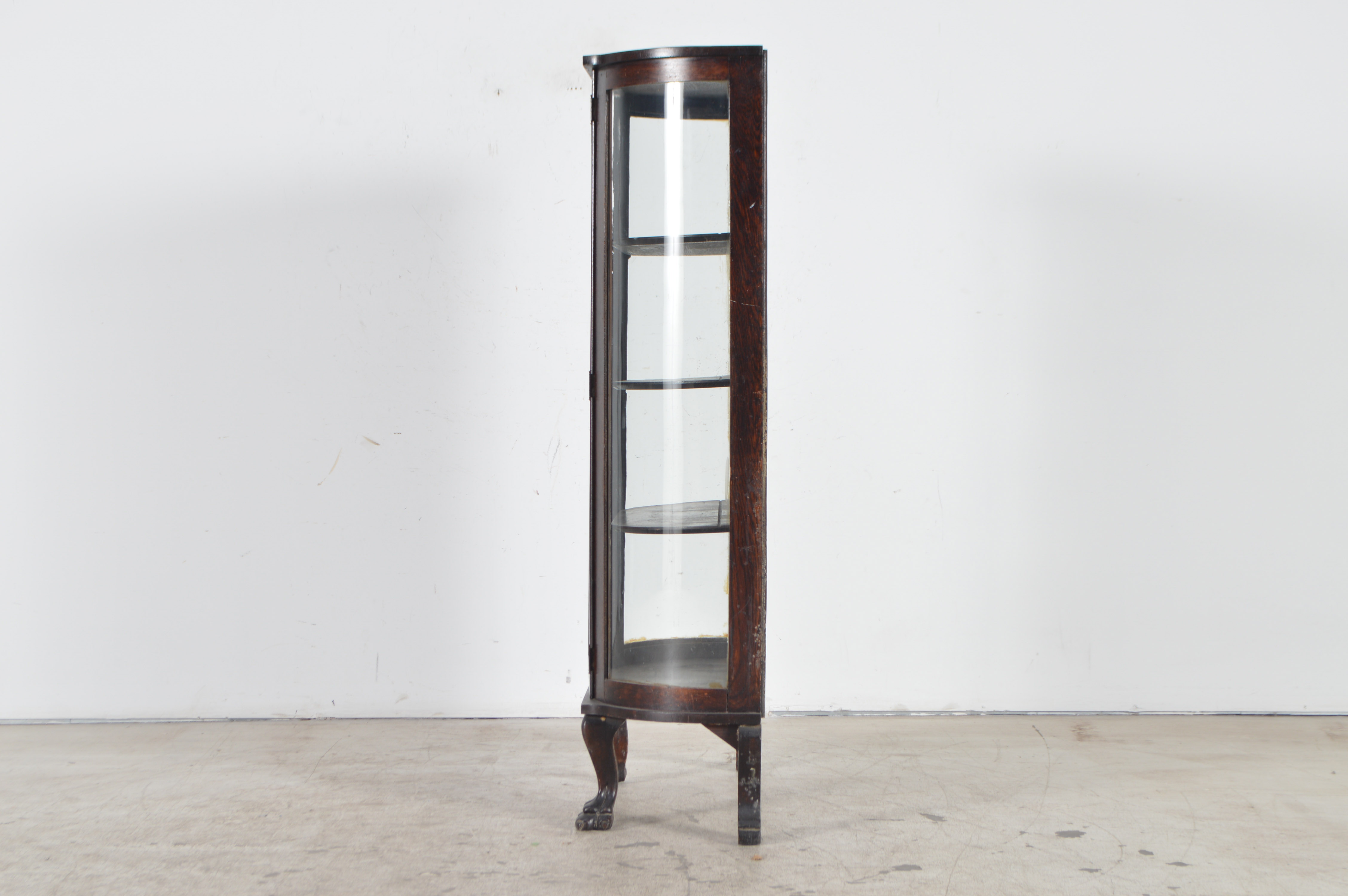 Antique Bow Front China Cabinet by the Ebert Furniture Company