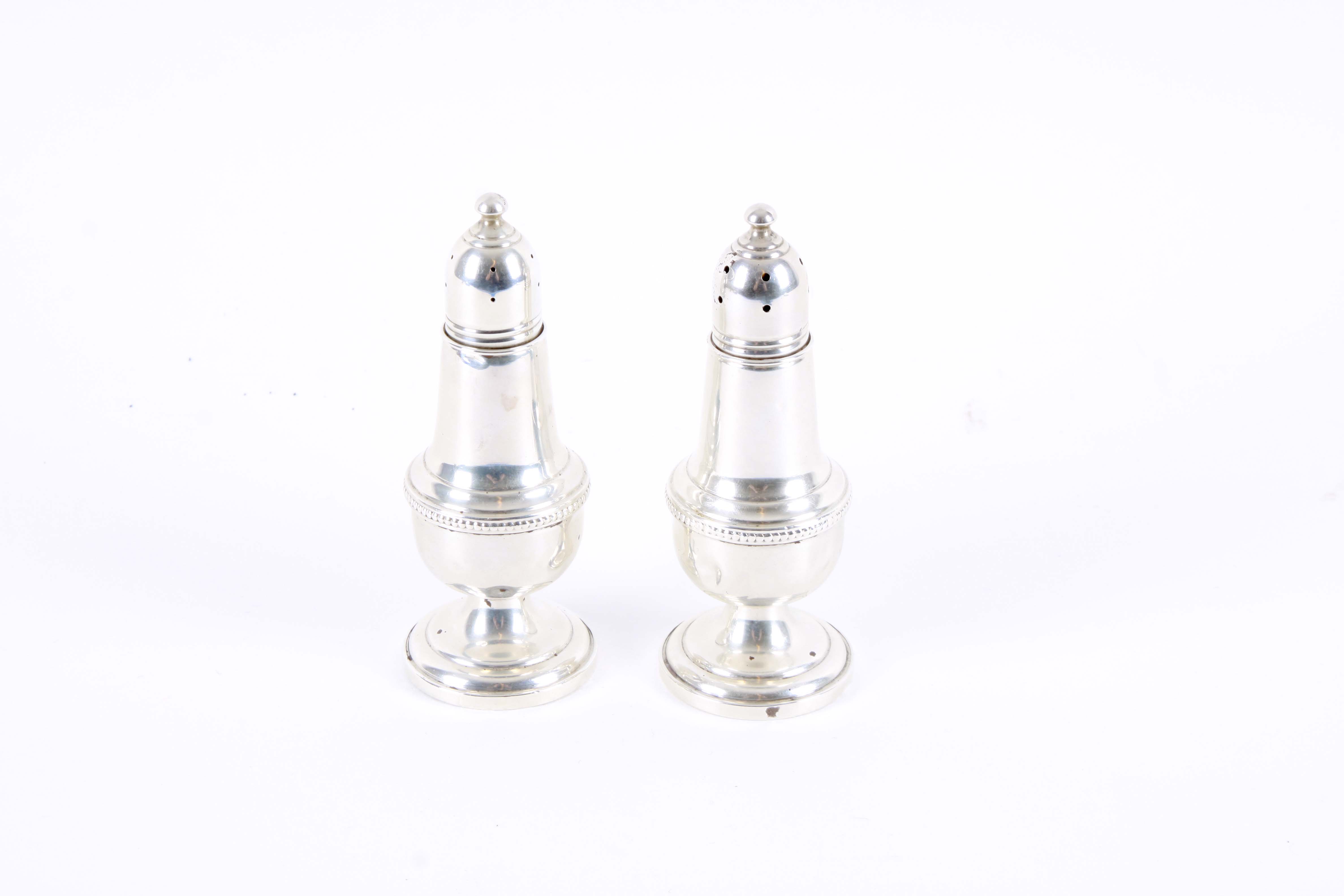 Weighted Sterling Silver Candlesticks and Salt and Pepper Shakers