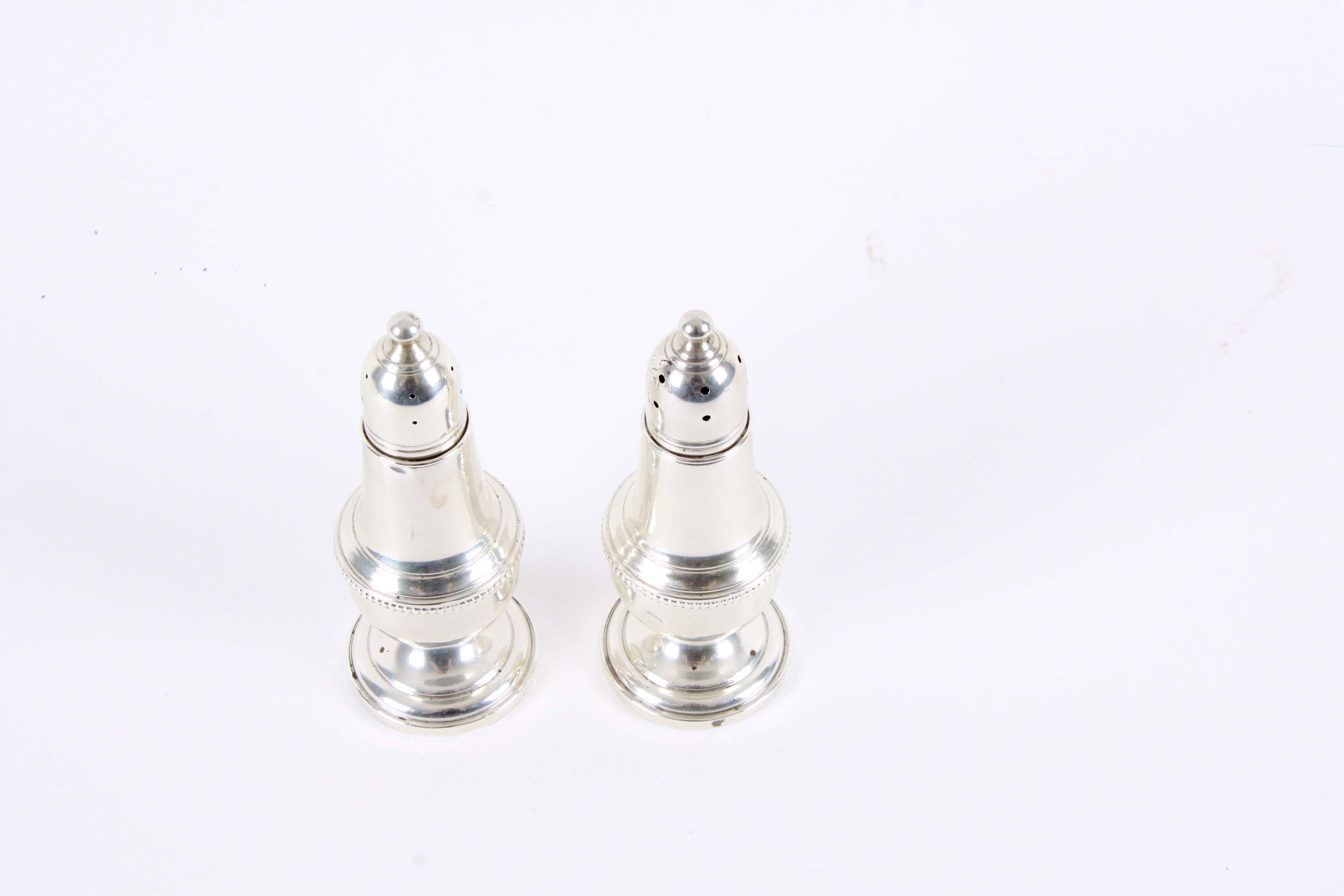Weighted Sterling Silver Candlesticks and Salt and Pepper Shakers