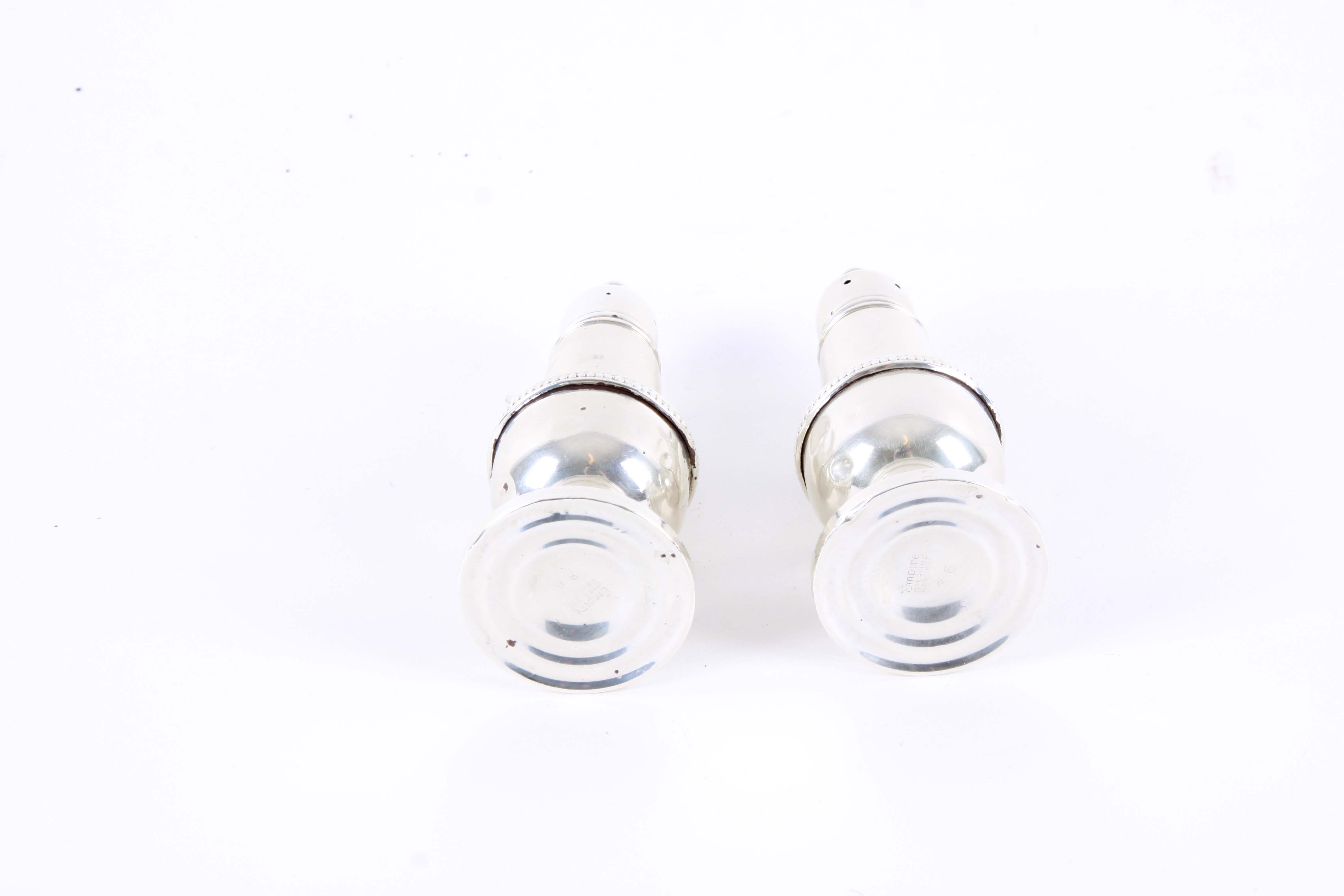 Weighted Sterling Silver Candlesticks and Salt and Pepper Shakers