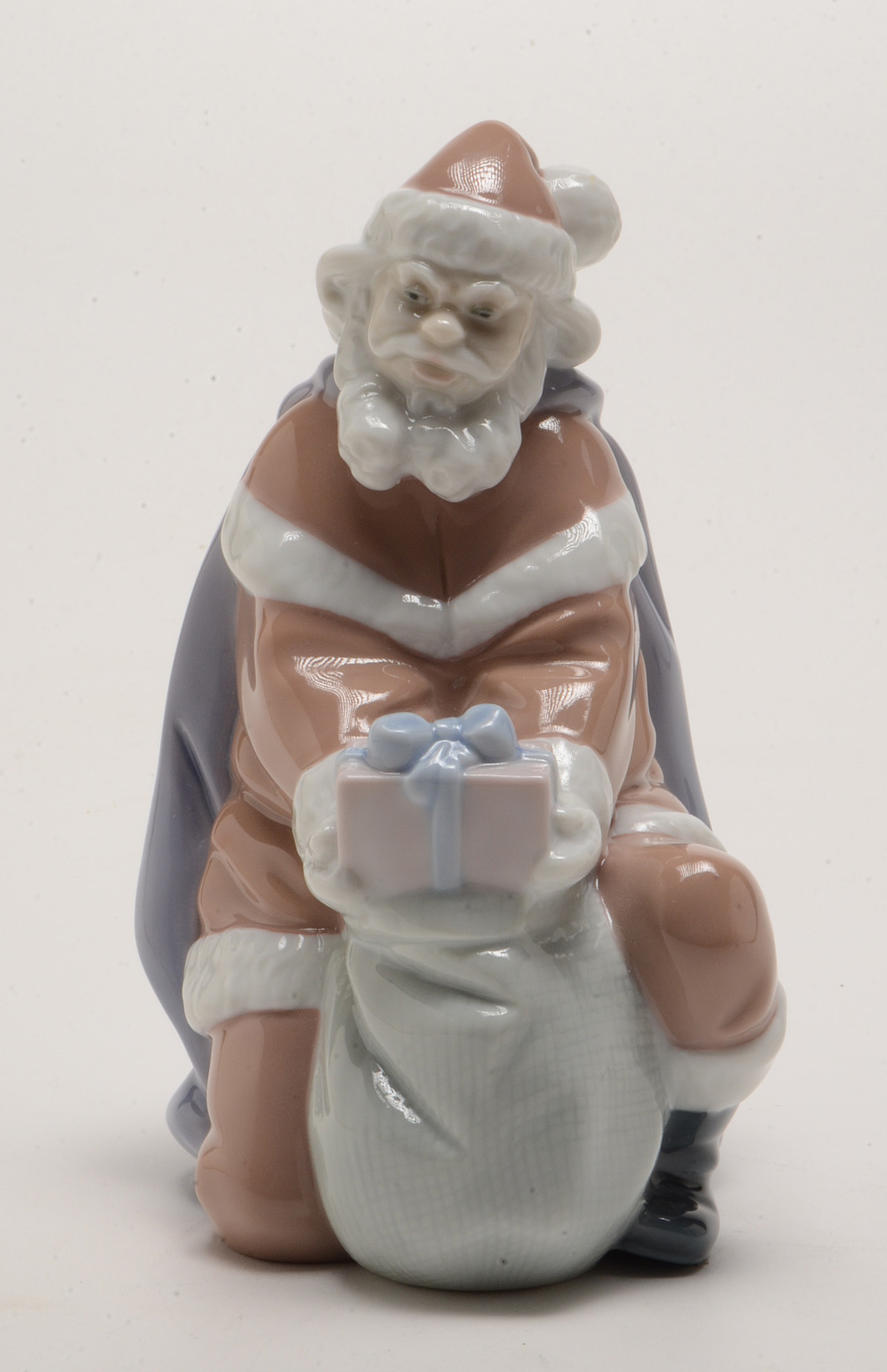 Lladro "A Gift From Santa" and "Santa's List" Figurines