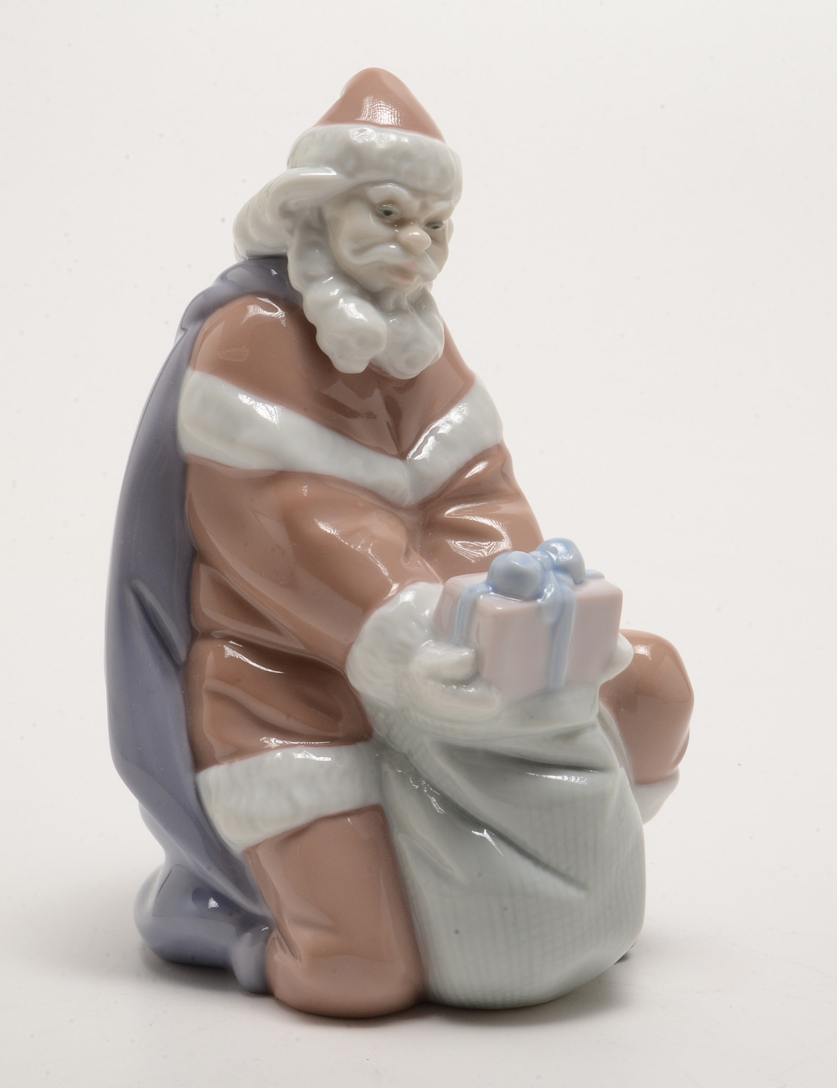 Lladro "A Gift From Santa" and "Santa's List" Figurines