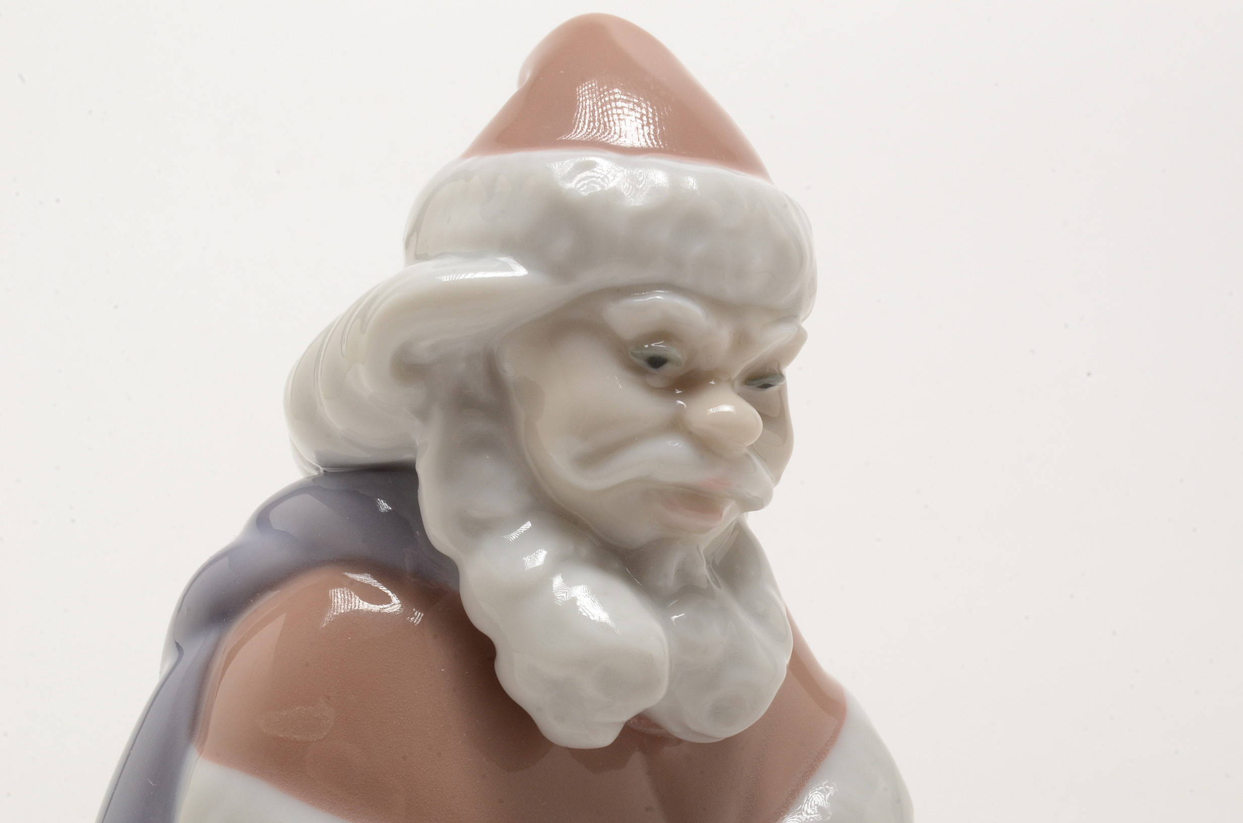 Lladro "A Gift From Santa" and "Santa's List" Figurines