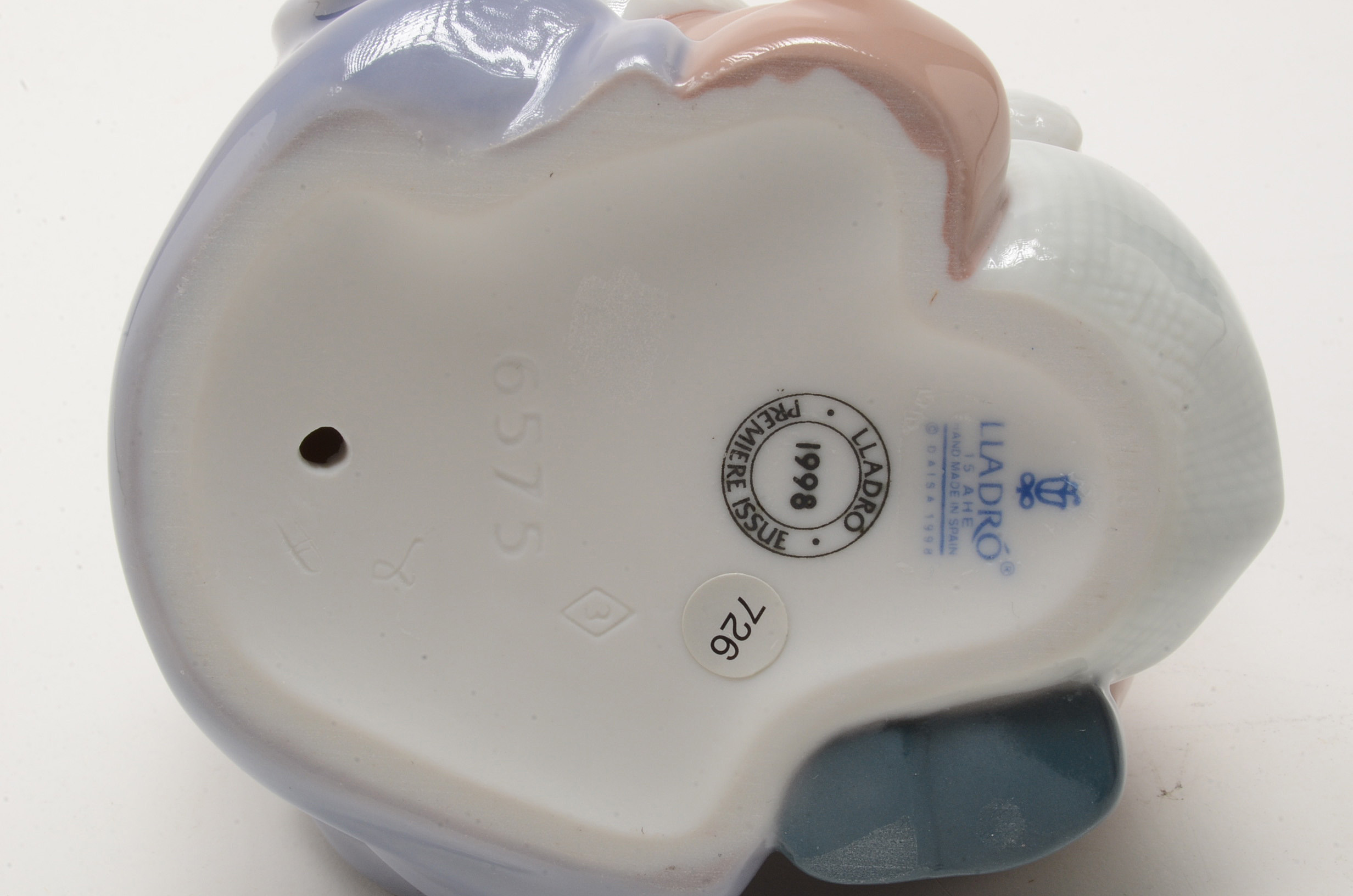 Lladro "A Gift From Santa" and "Santa's List" Figurines