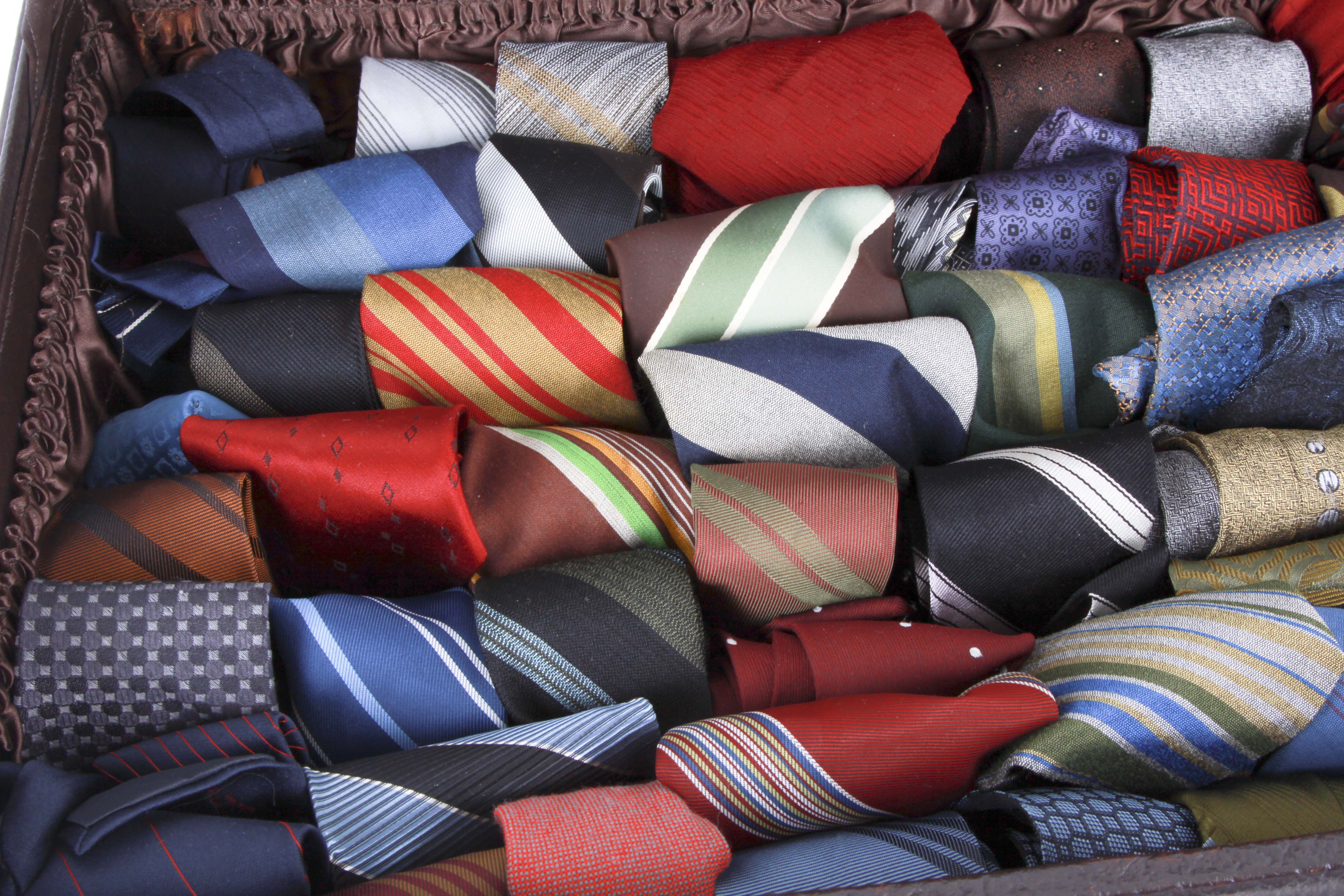 Vintage Suitcase and Tie Assortment