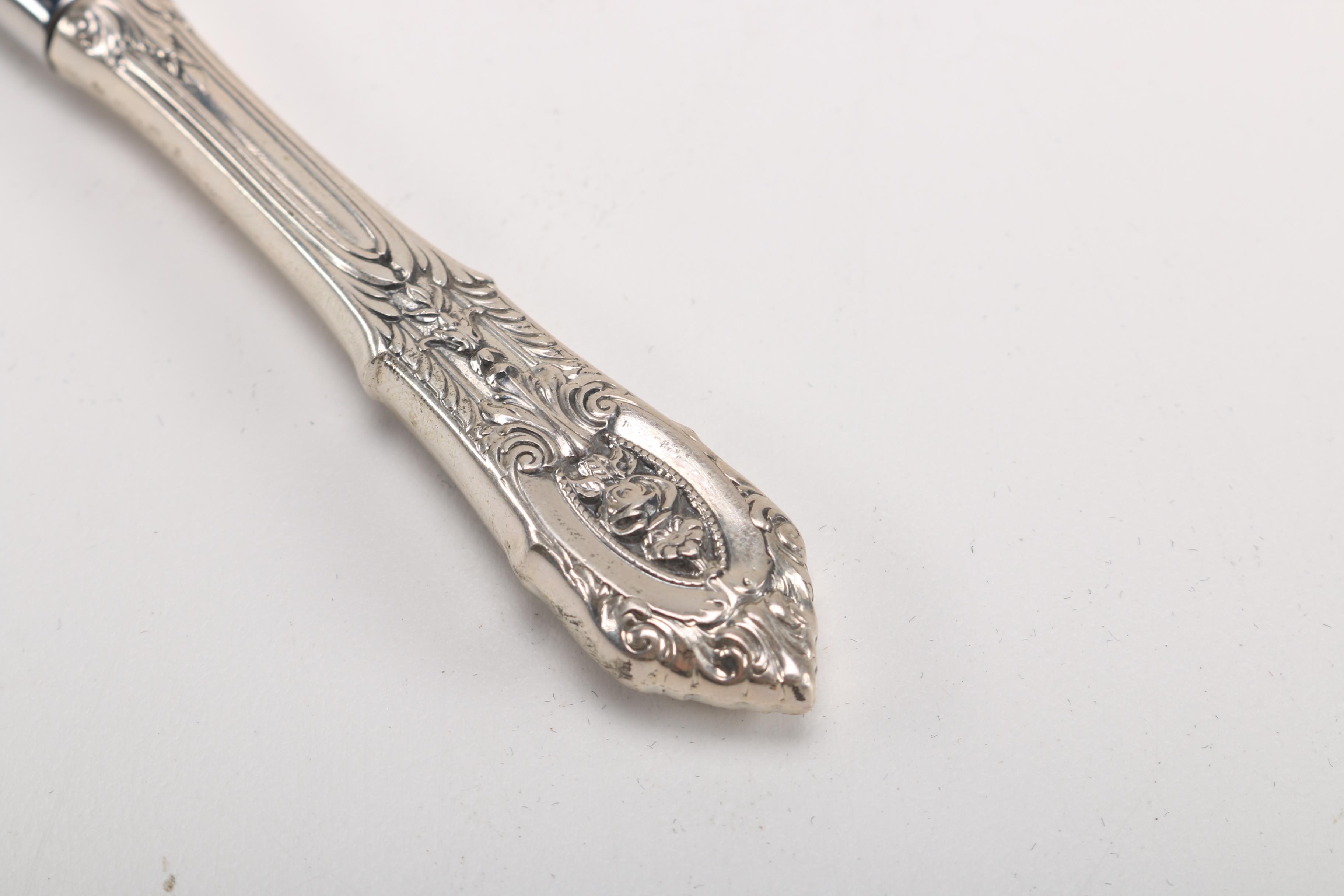 Wallace Sterling Silver Flatware in "Rose Point"