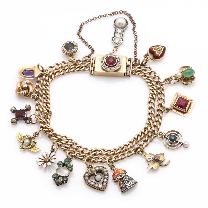 Yellow Gold Charm Bracelet Featuring Edwardian and Victorian Charms