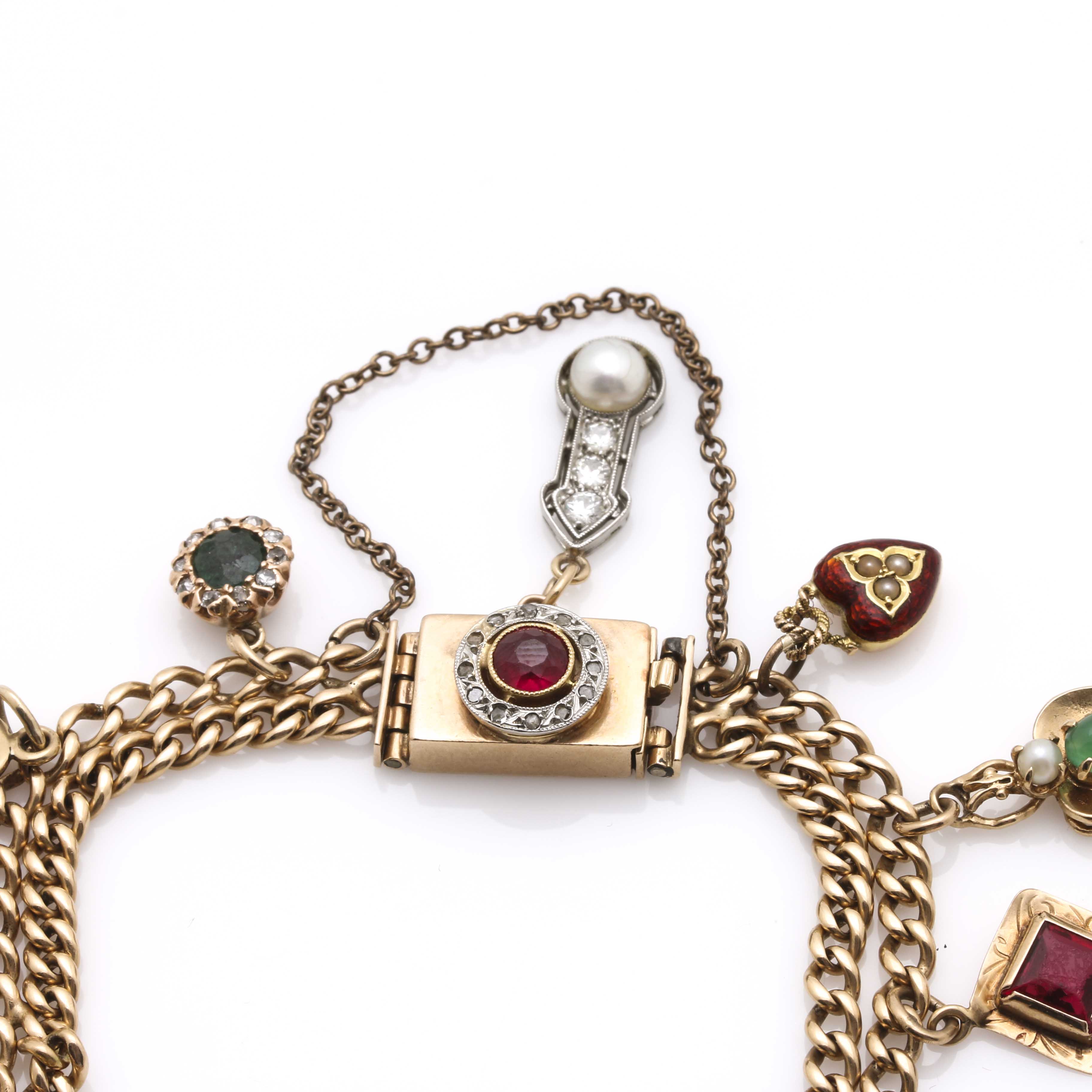 Yellow Gold Charm Bracelet Featuring Edwardian and Victorian Charms