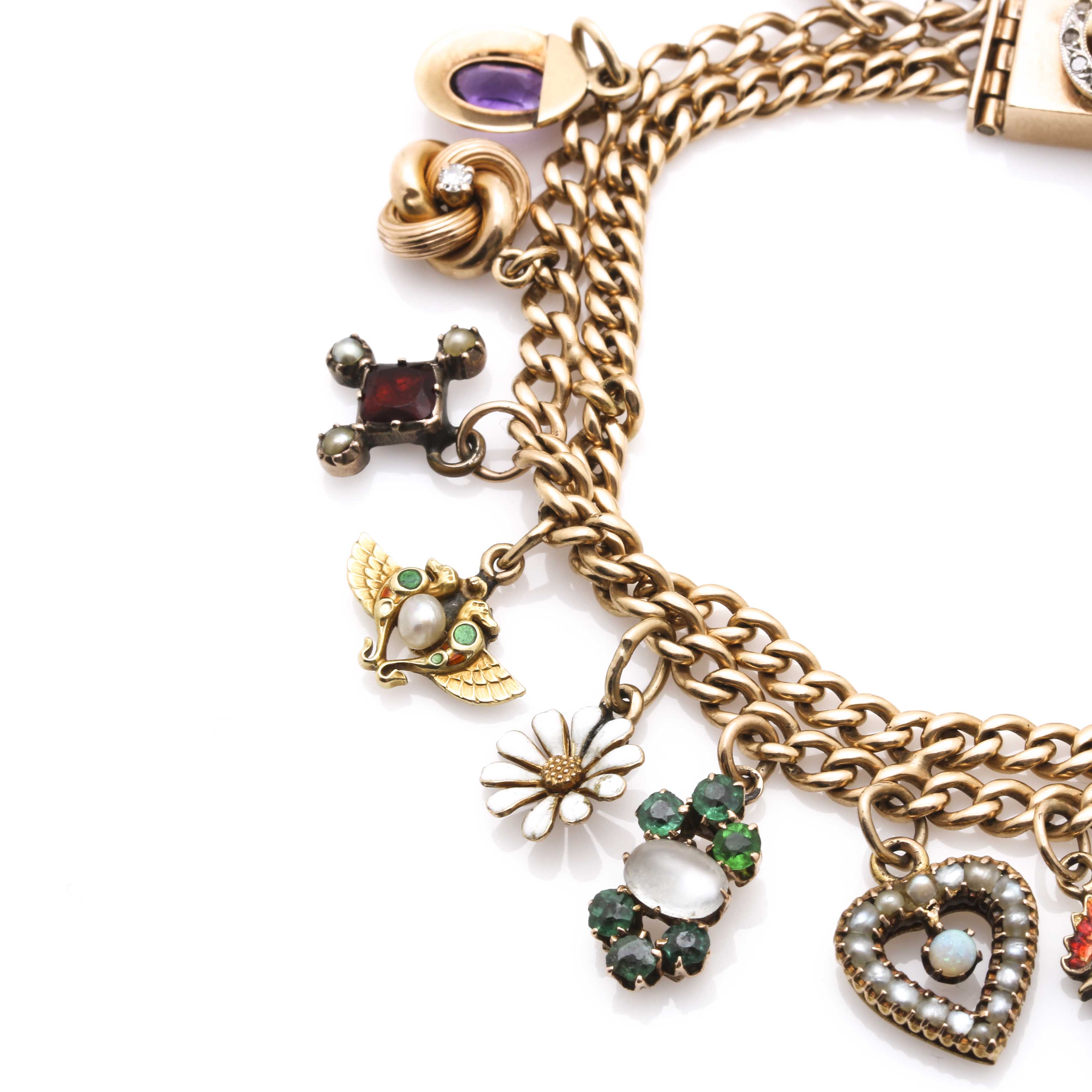 Yellow Gold Charm Bracelet Featuring Edwardian and Victorian Charms