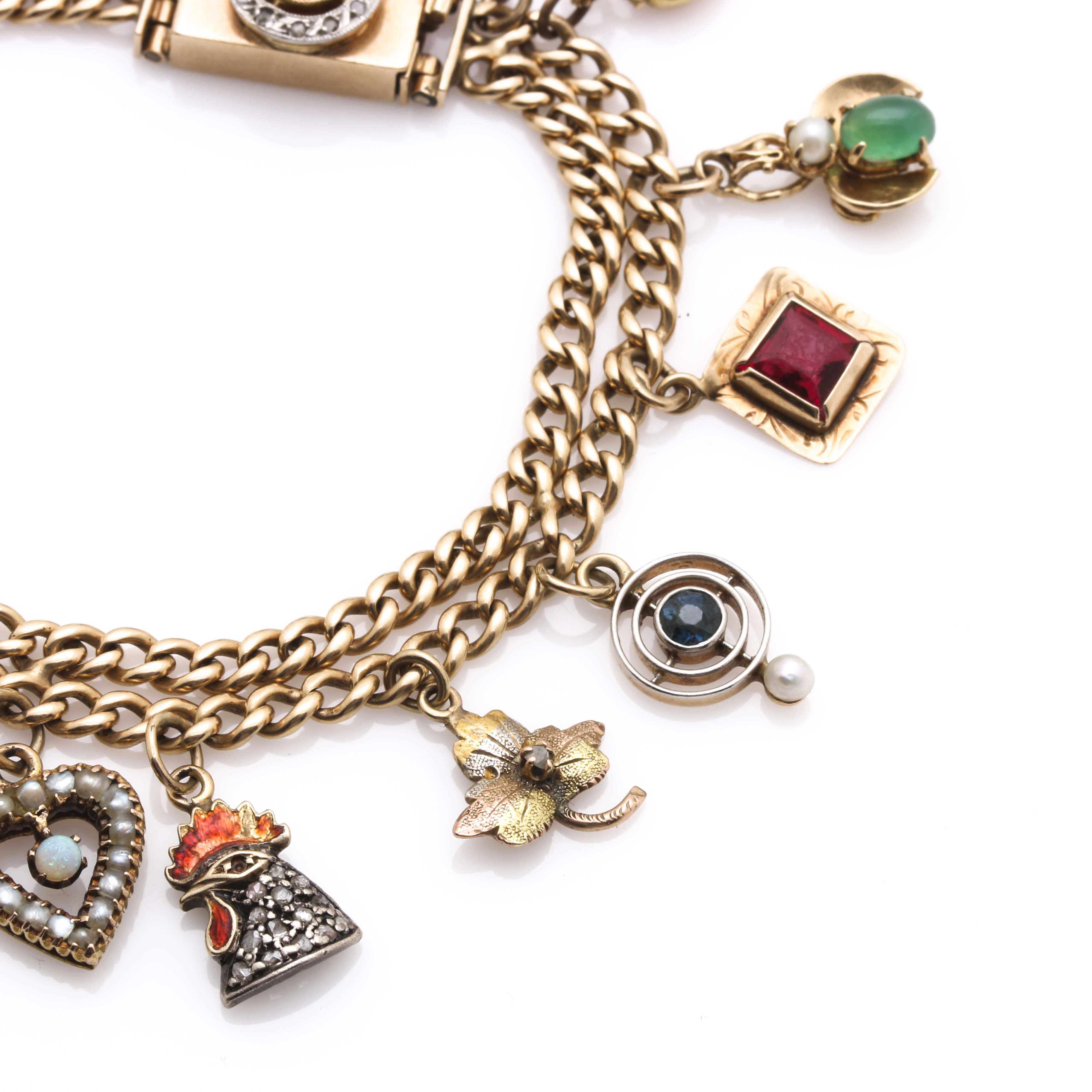 Yellow Gold Charm Bracelet Featuring Edwardian and Victorian Charms