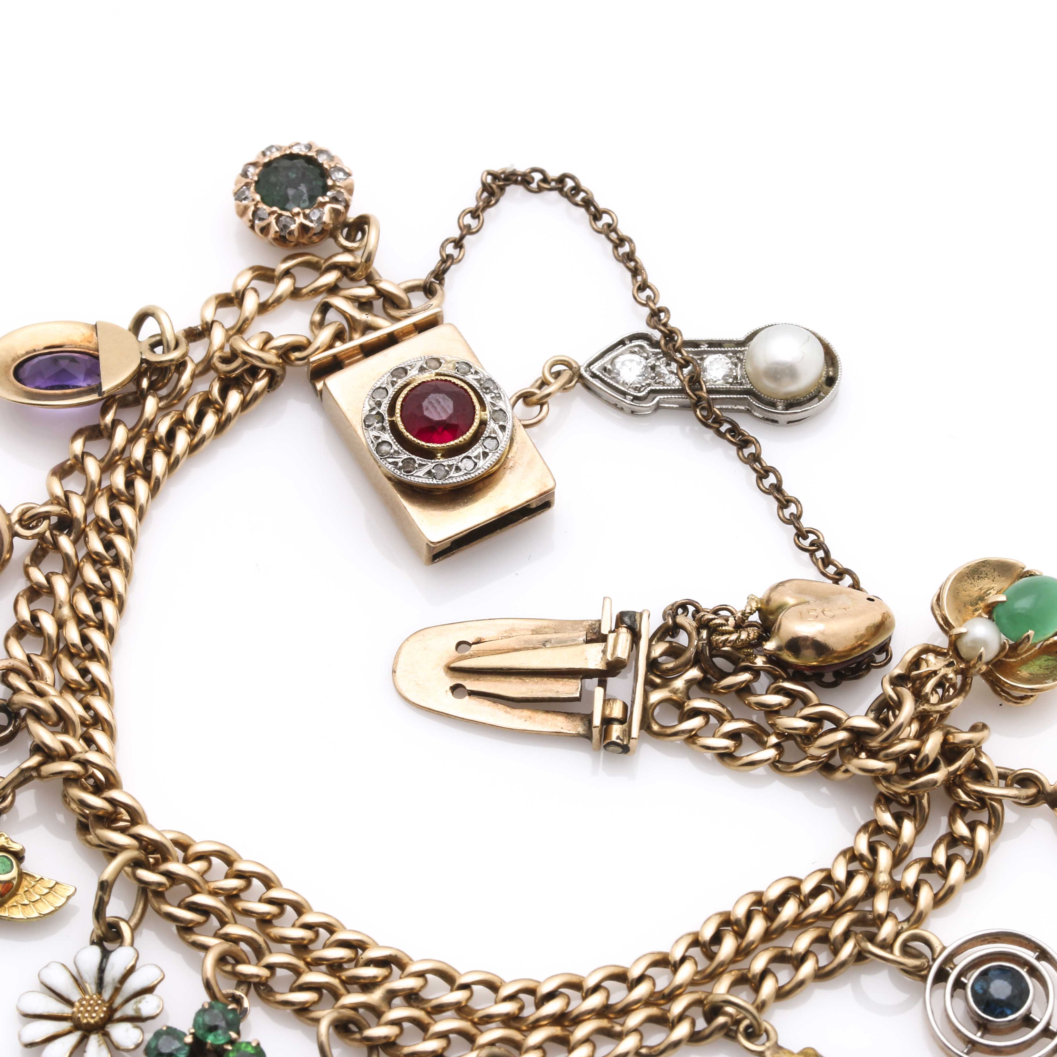 Yellow Gold Charm Bracelet Featuring Edwardian and Victorian Charms