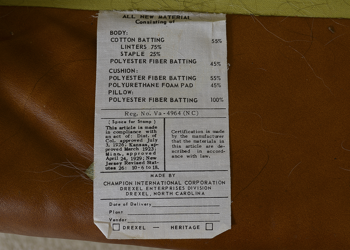 Two Vintage Drexel Heritage Leather Armchairs and Ottoman