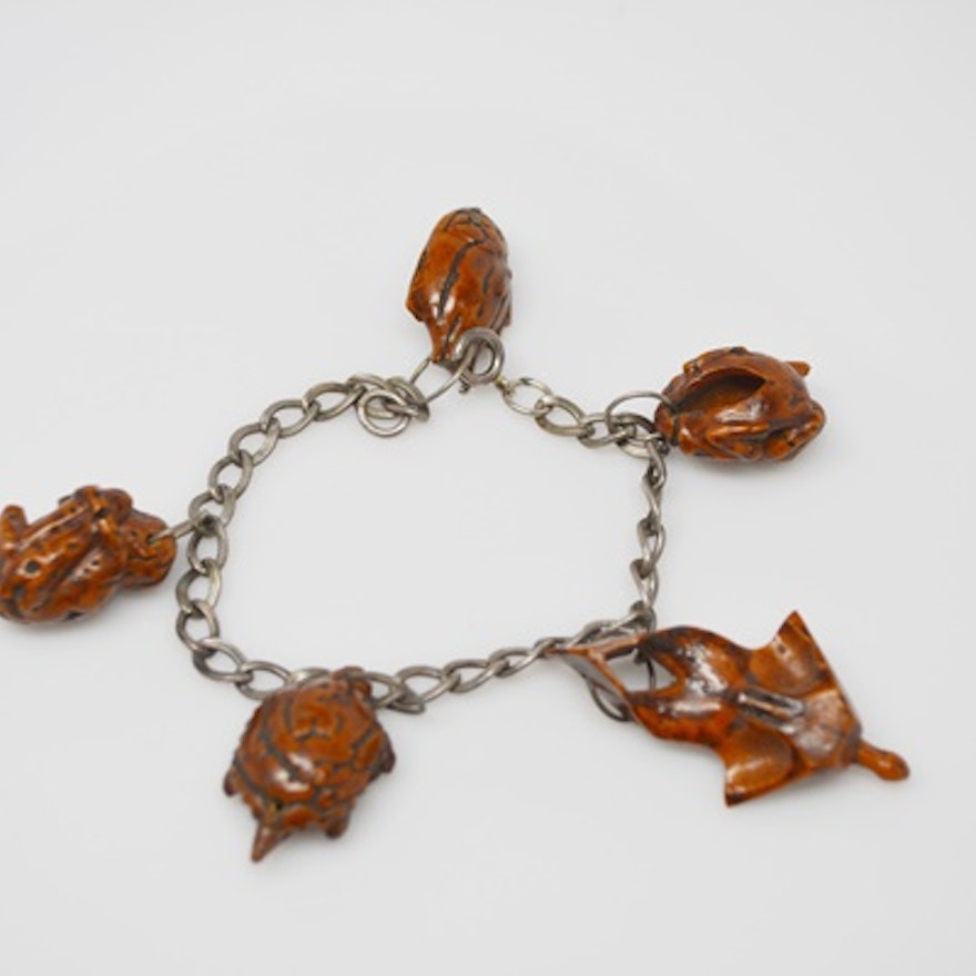 Sterling Silver Bracelet With Hand Carved Peach Pit Charms