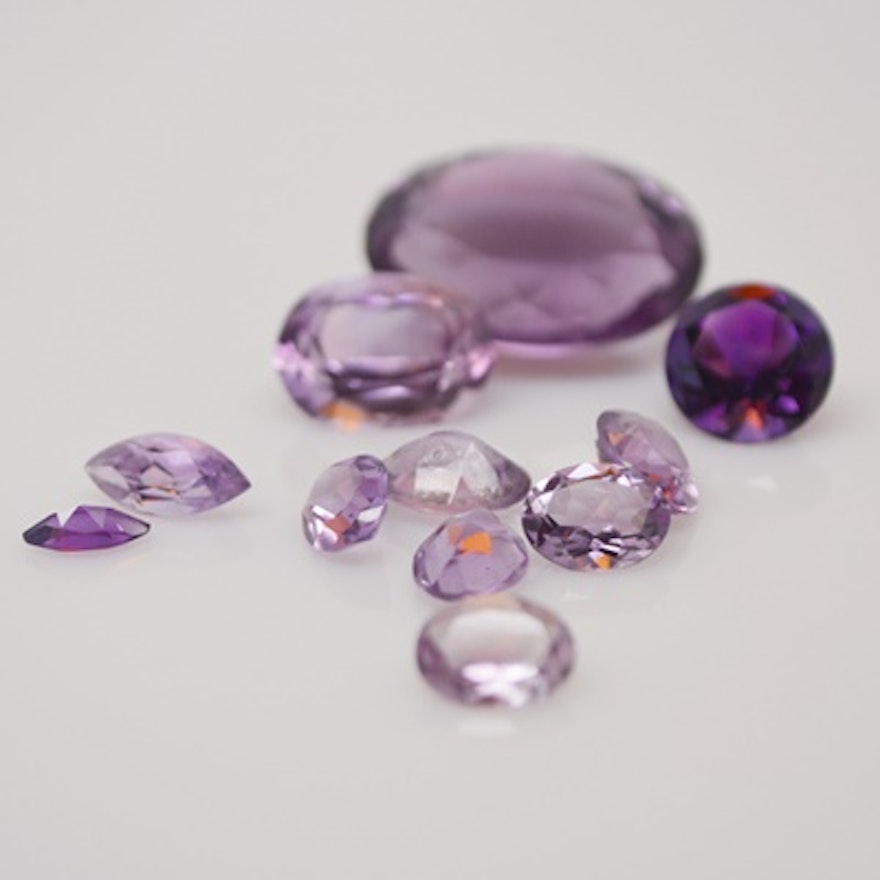 Twelve Loose 39.47 CTW Natural Amethyst Gemstones