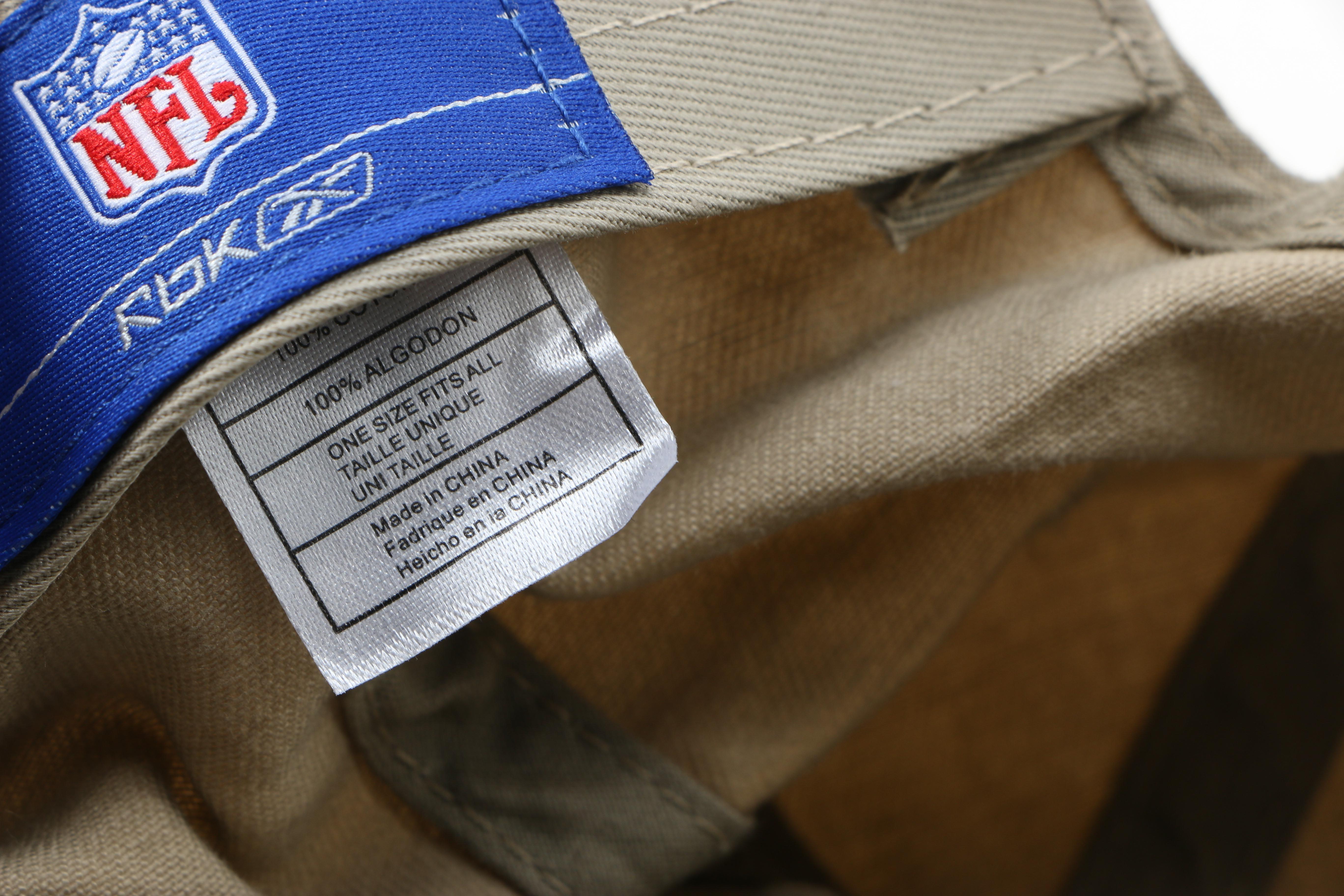 Collection of Hats and Super Bowl Souvenirs