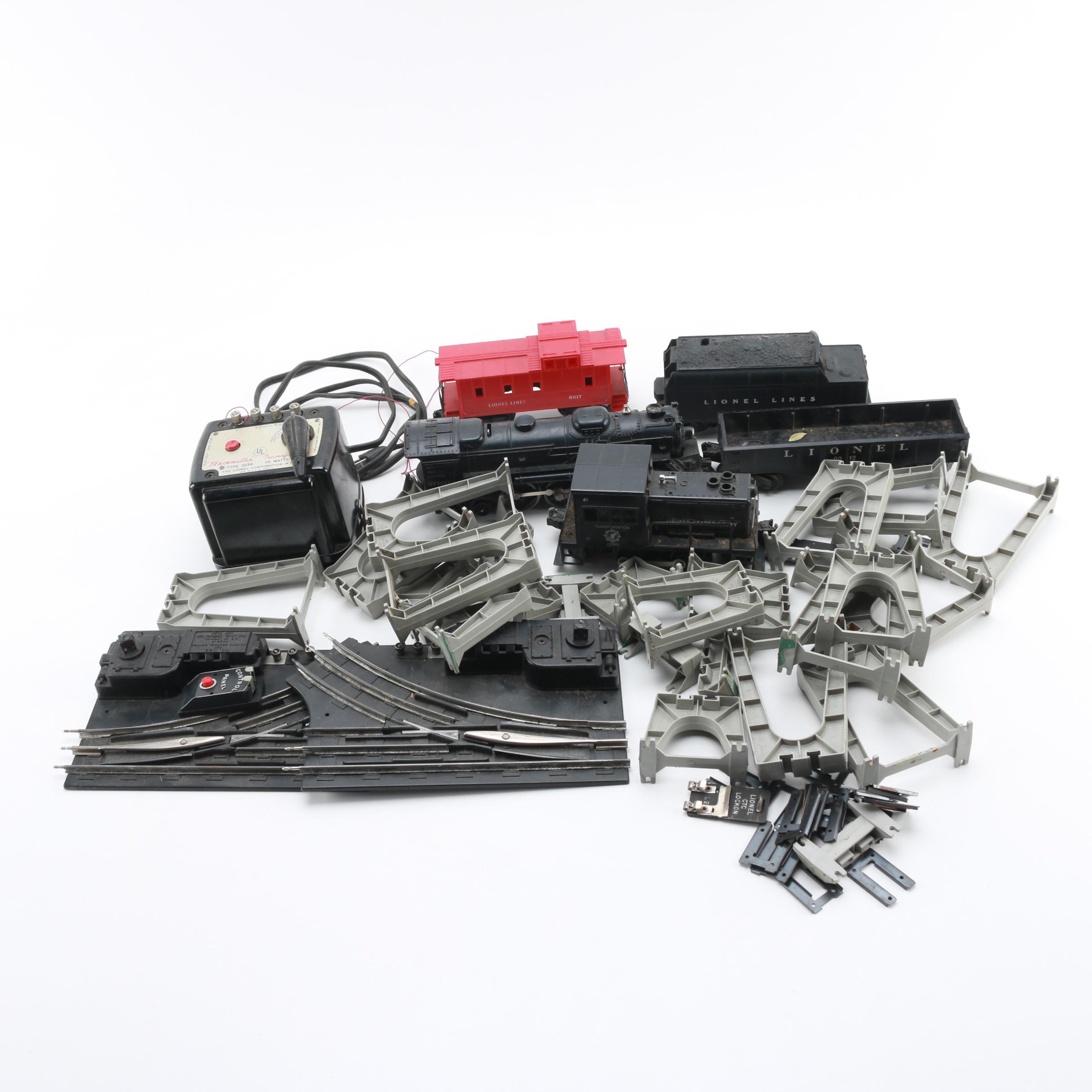 Assortment of Lionel Train Cars and Parts