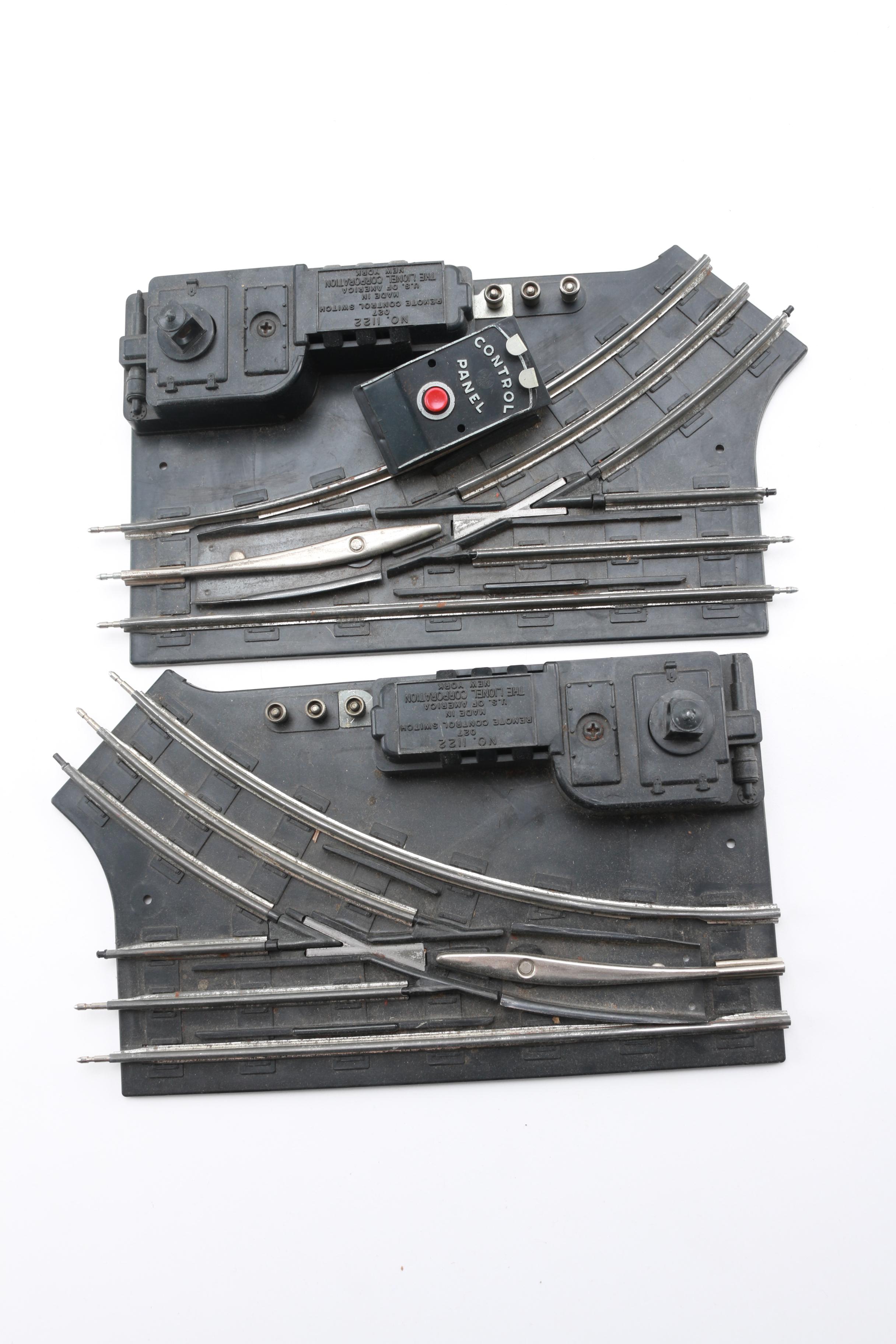 Assortment of Lionel Train Cars and Parts