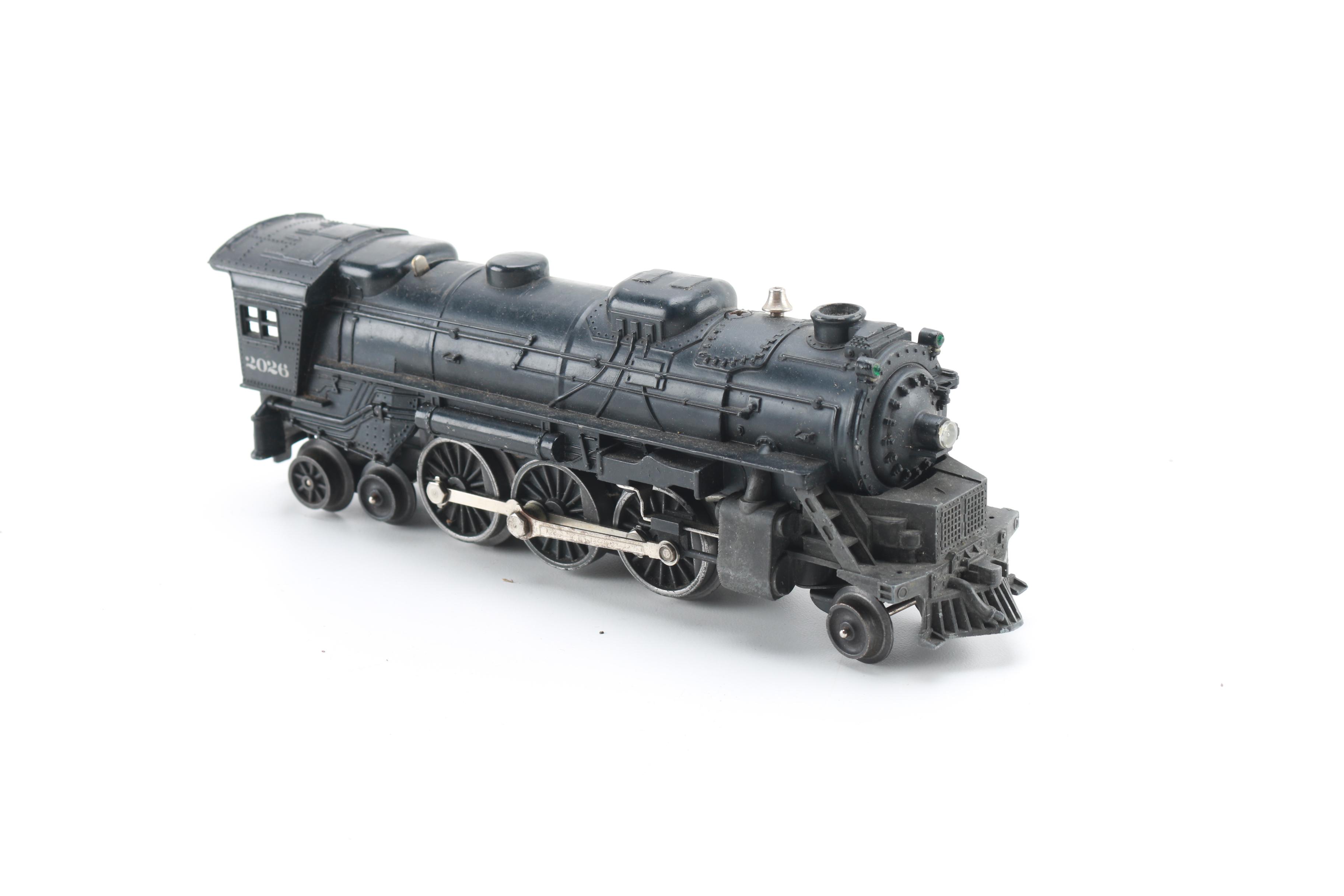 Assortment of Lionel Train Cars and Parts