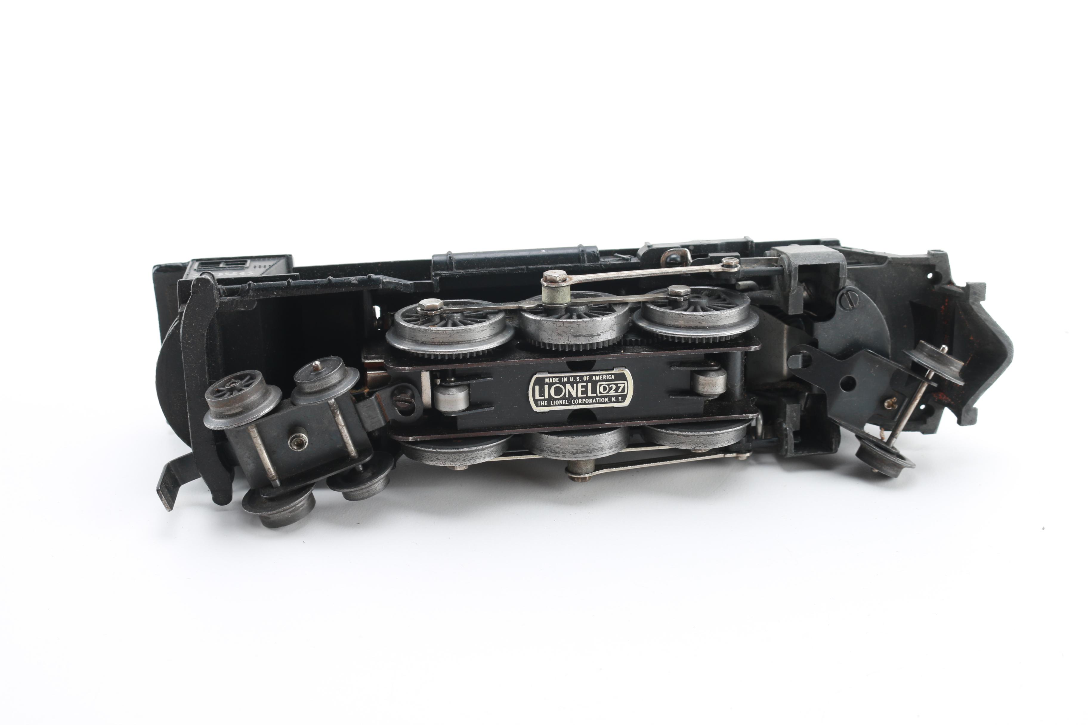 Assortment of Lionel Train Cars and Parts