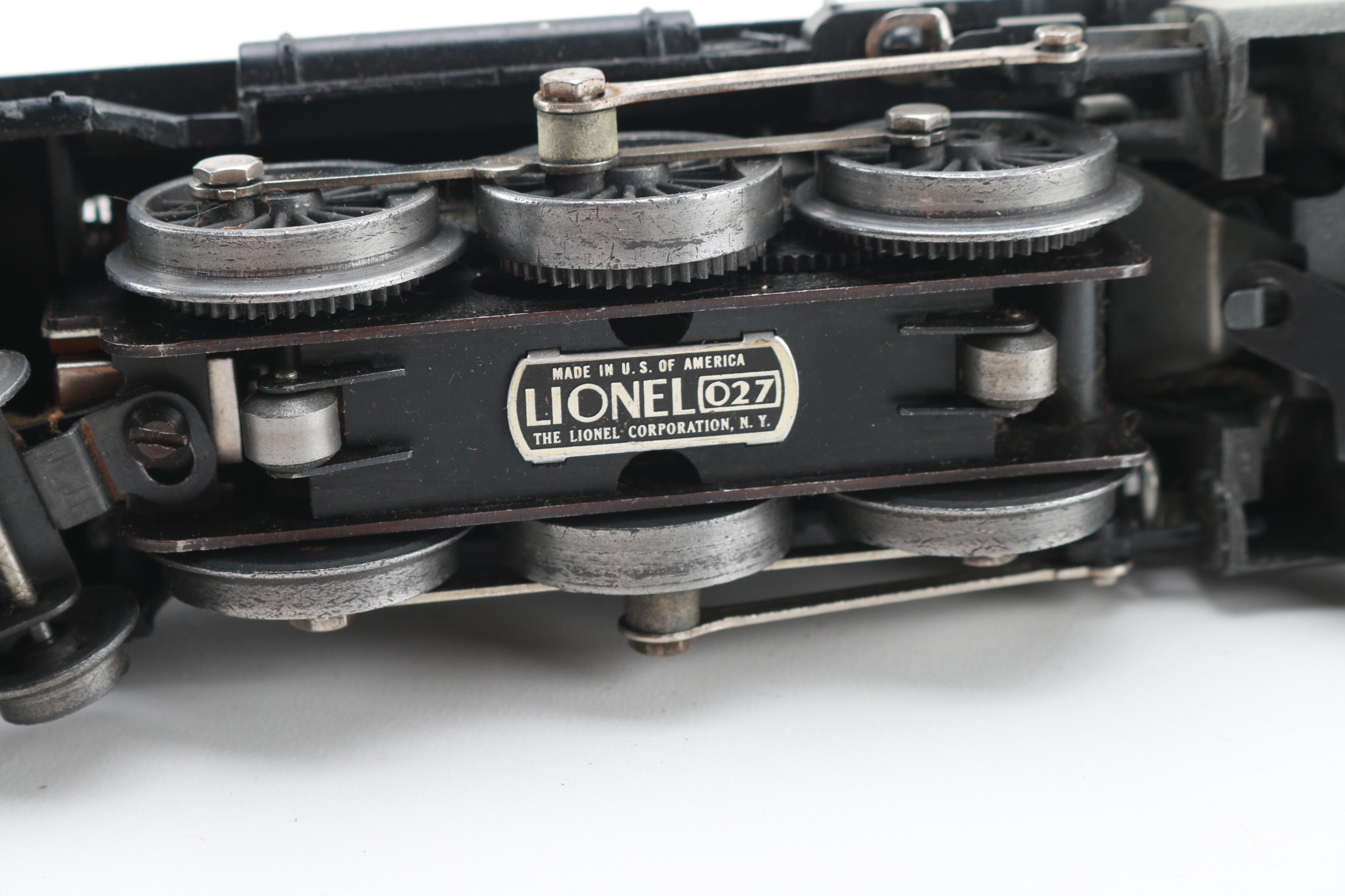 Assortment of Lionel Train Cars and Parts