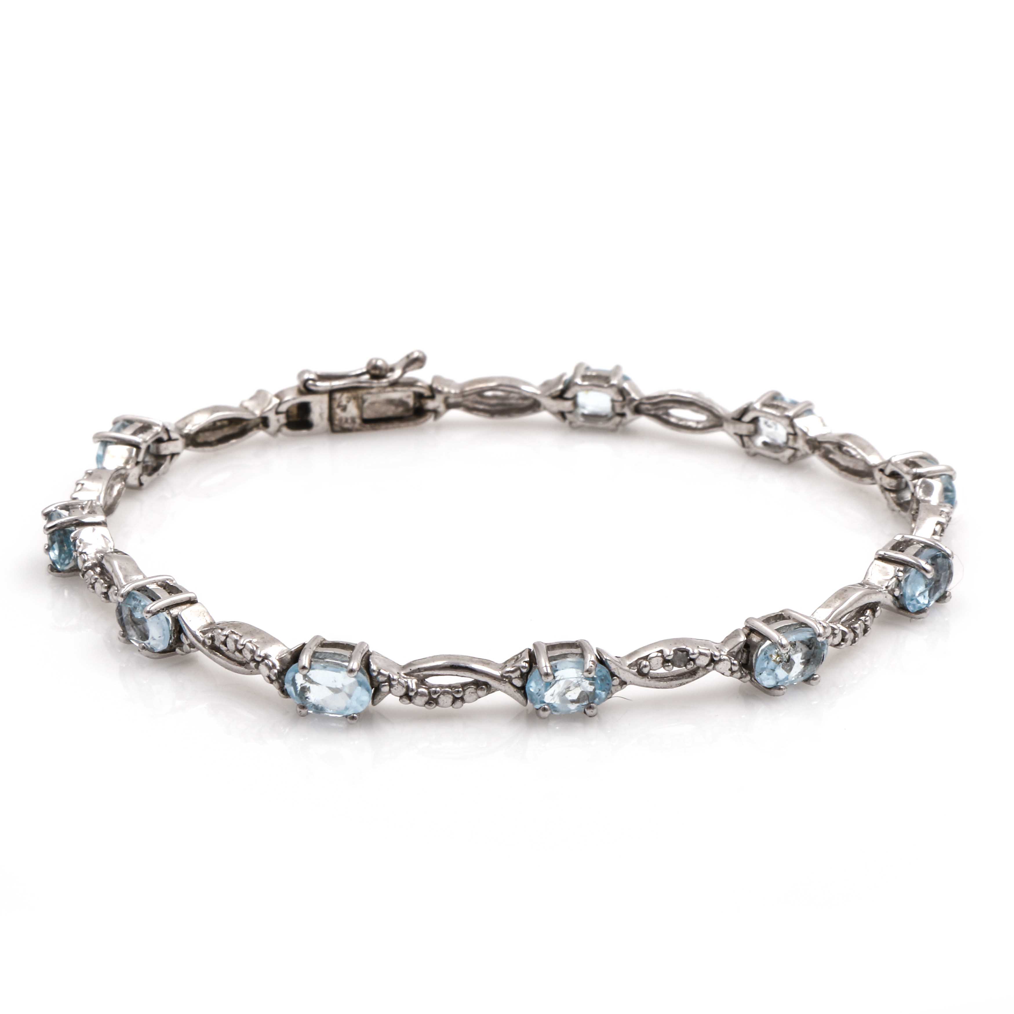 Sterling Silver Blue Topaz and Diamond Bracelet
