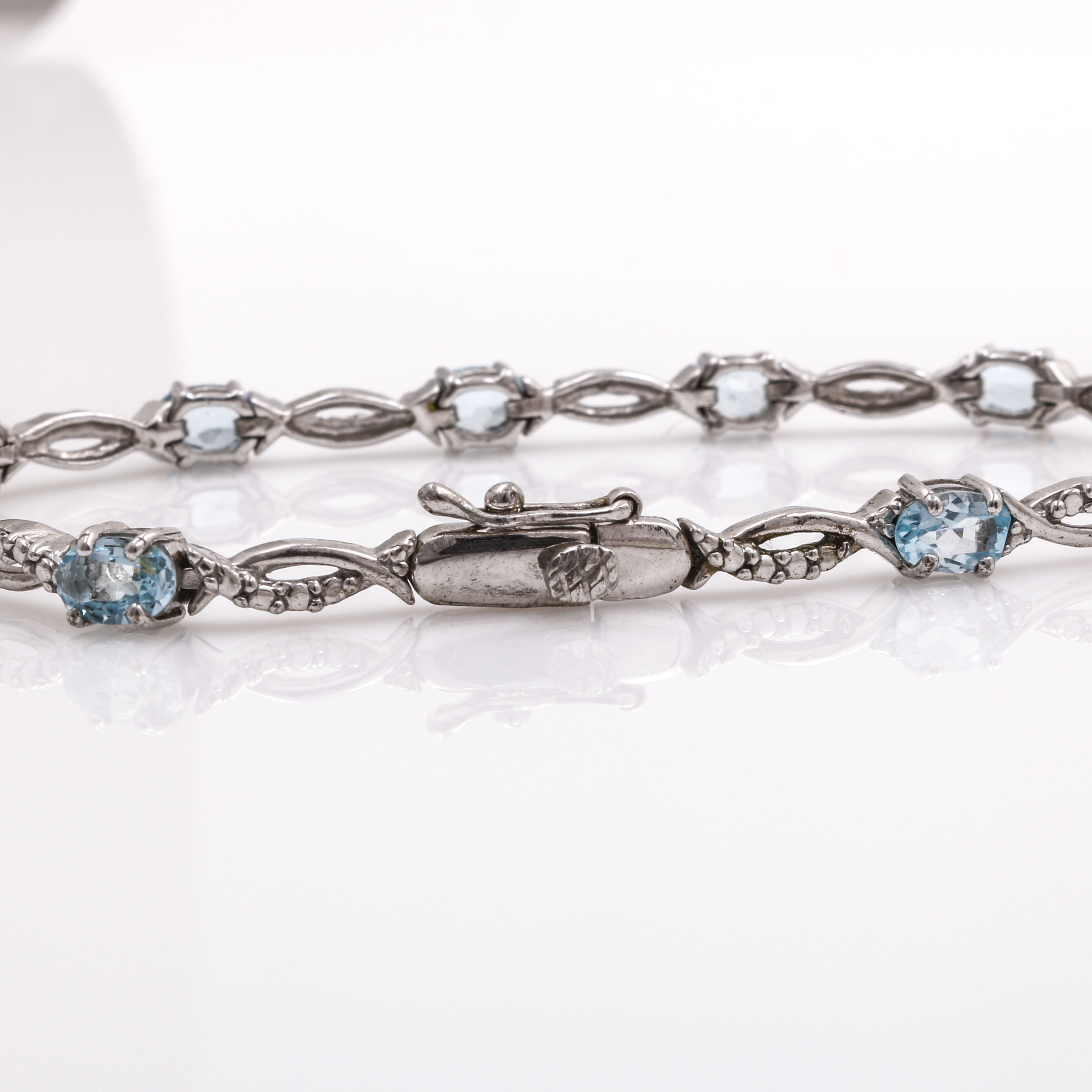 Sterling Silver Blue Topaz and Diamond Bracelet
