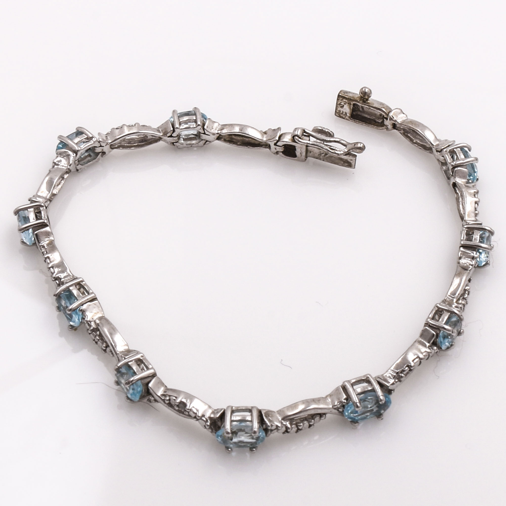 Sterling Silver Blue Topaz and Diamond Bracelet