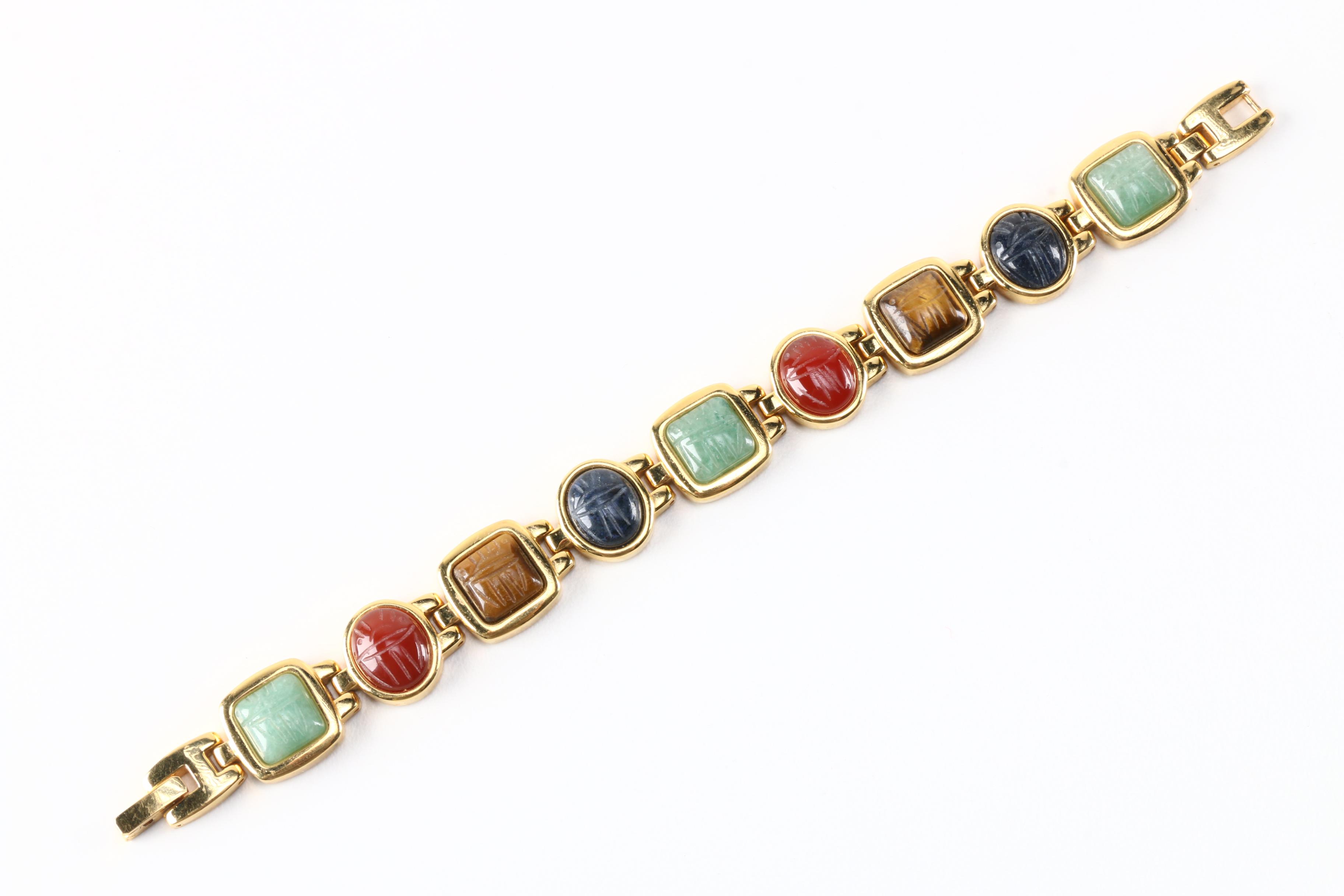 Costume Jewelry Including Watch With Carved Stones