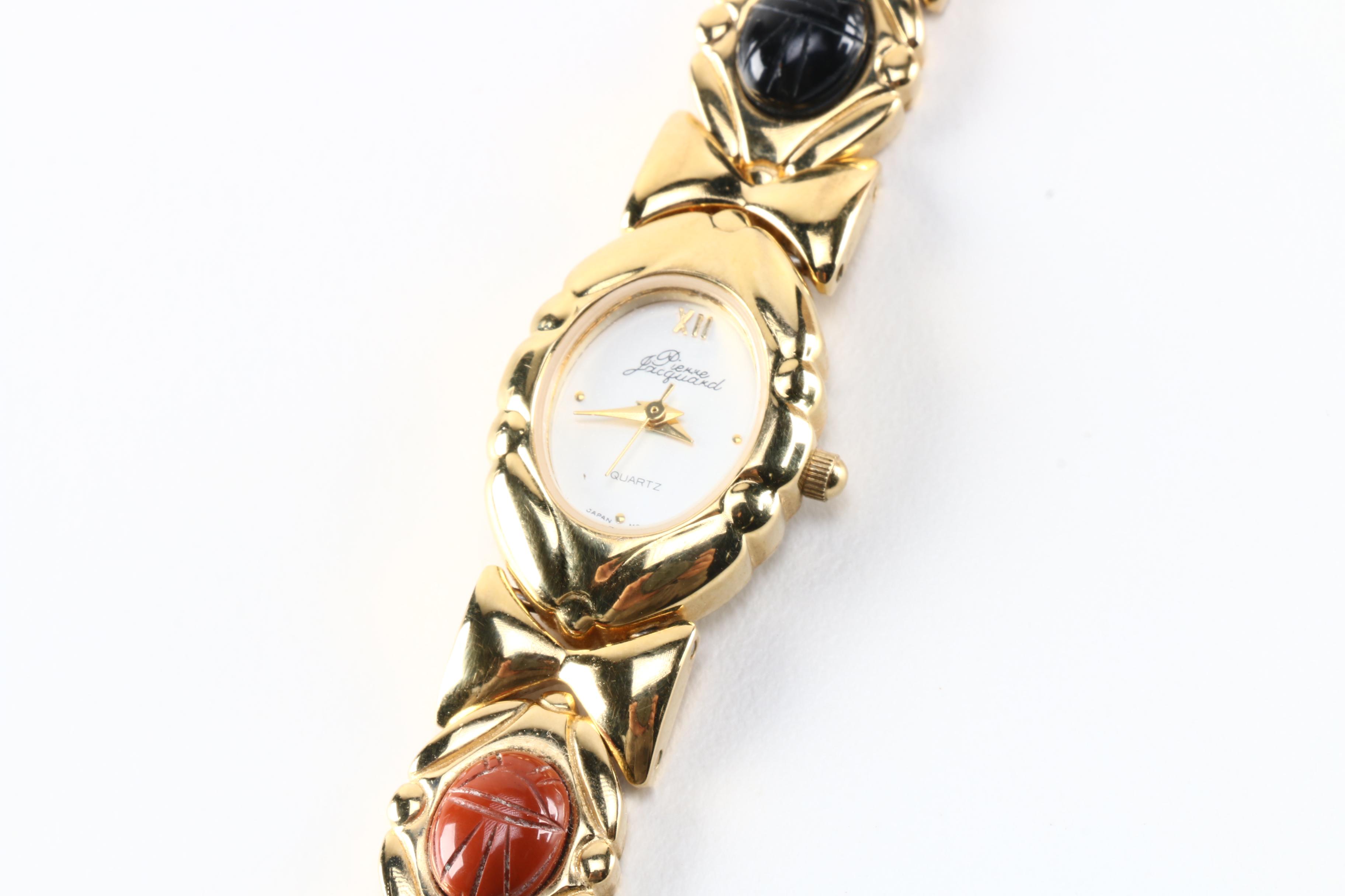 Costume Jewelry Including Watch With Carved Stones