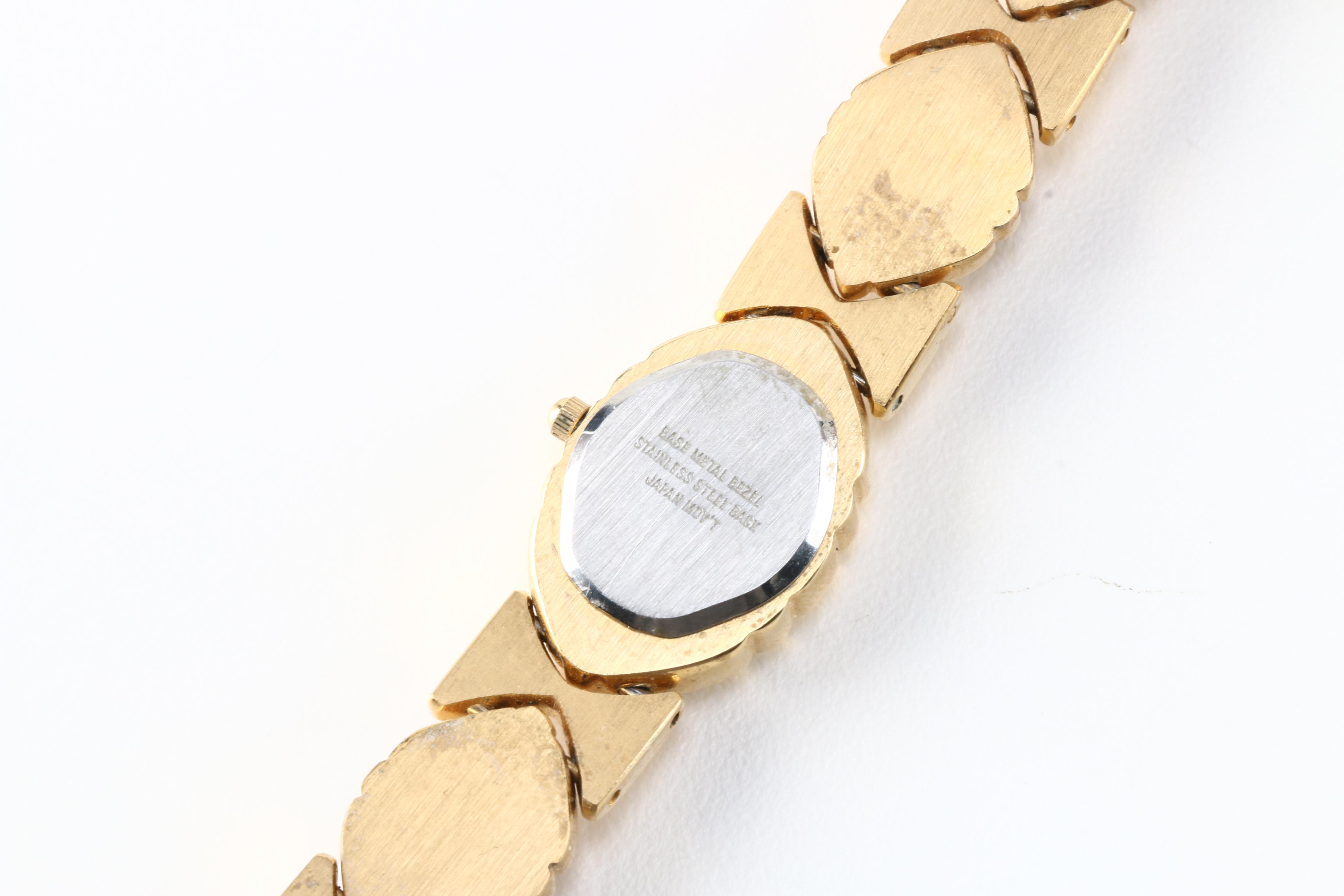 Costume Jewelry Including Watch With Carved Stones