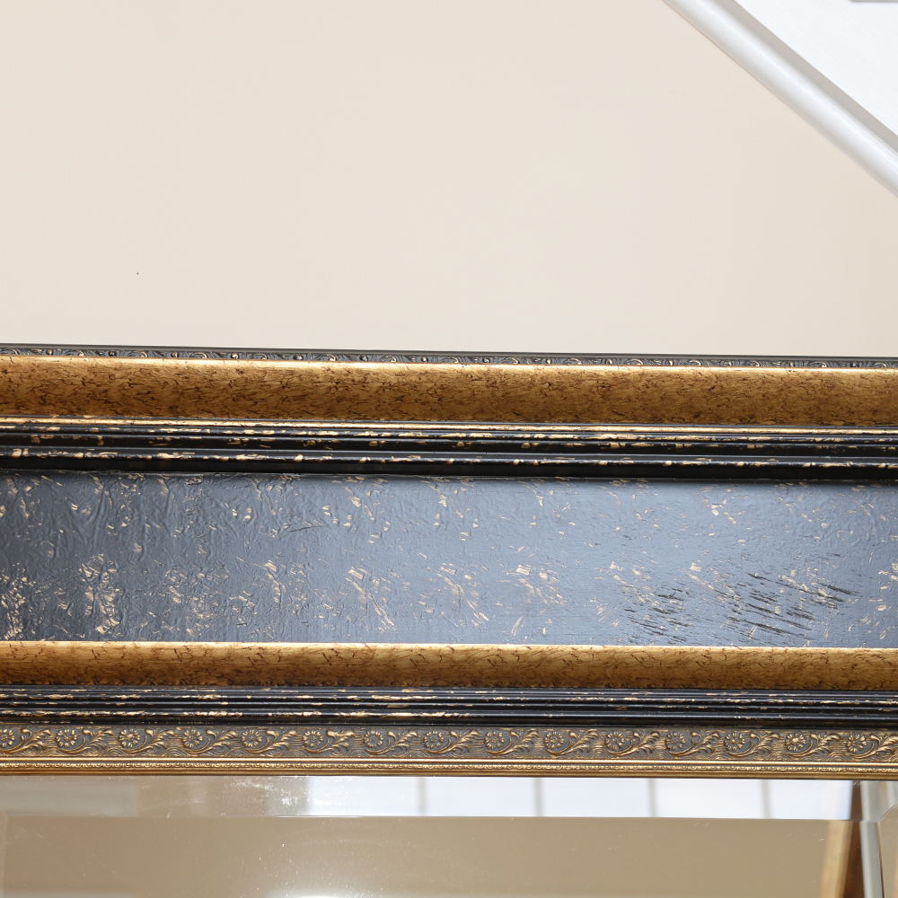 Black and Gold Tone Wall Mirror by The Bombay Company