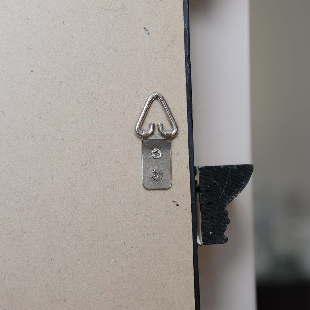 Black and Gold Tone Wall Mirror by The Bombay Company